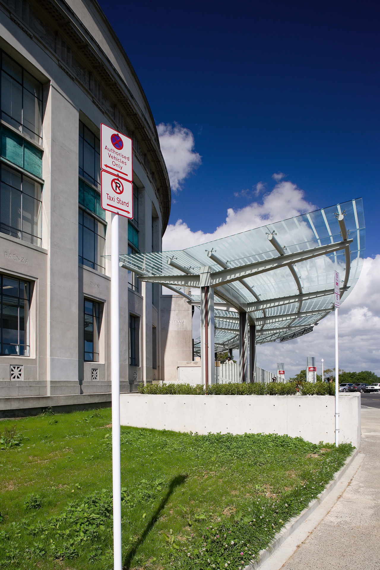 A view of some roading by Traffic Design architecture, building, city, corporate headquarters, daytime, facade, metropolitan area, real estate, residential area, sky, structure, tree, urban area, gray