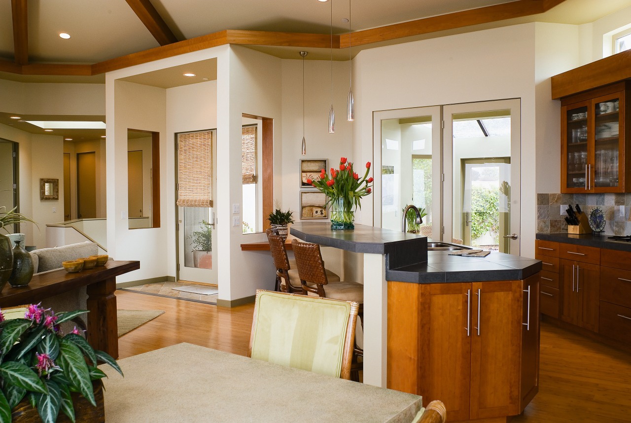 Open plan kitchen, dining and entrance area with cabinetry, ceiling, countertop, cuisine classique, home, interior design, kitchen, living room, real estate, room, window, brown, gray