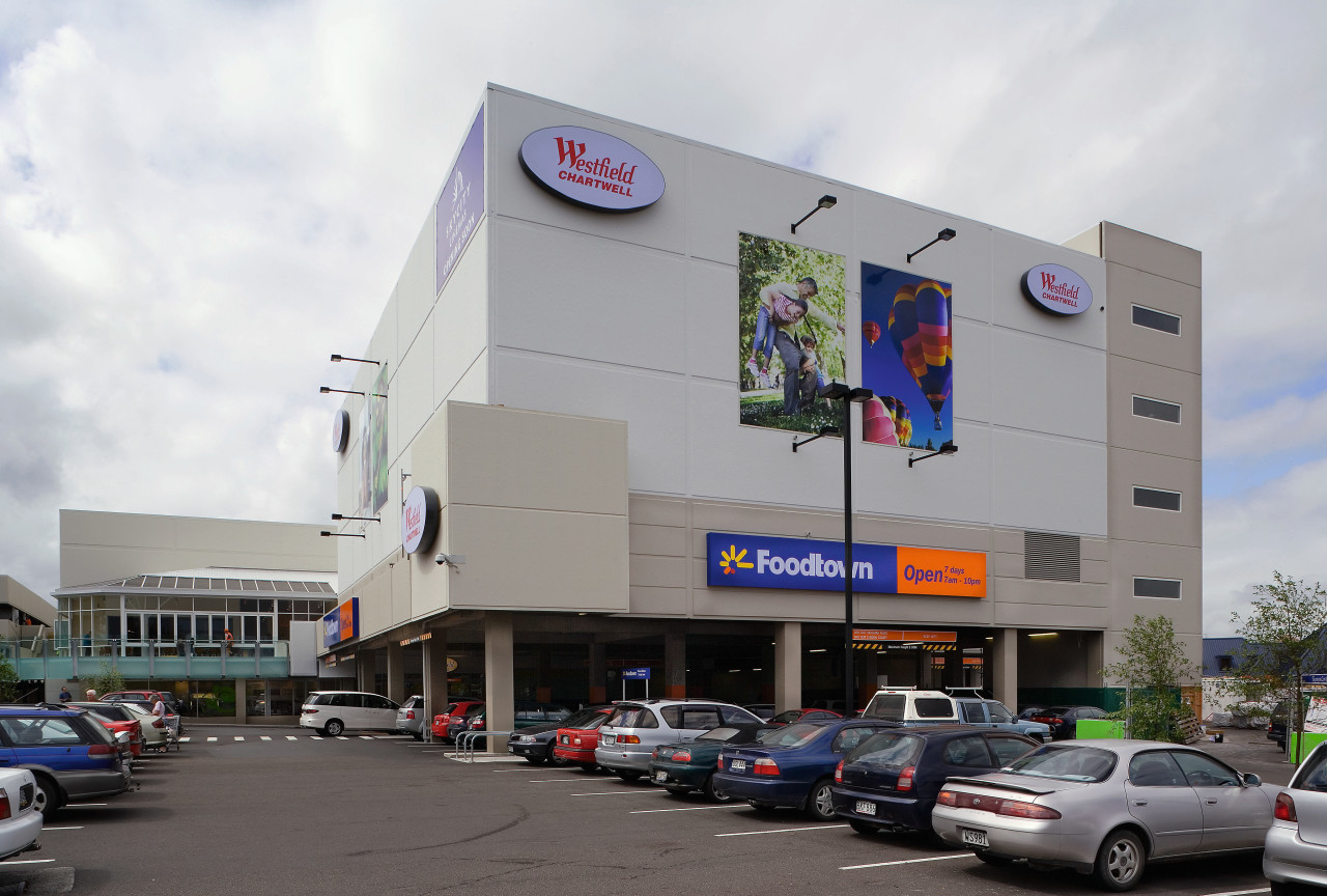 View of the 3D signs installed in the advertising, building, car, city, commercial building, mixed use, shopping mall, white, gray