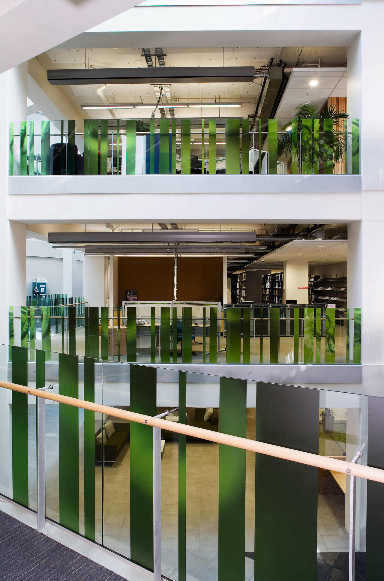 A view of ATCO Steel Devlopments' runs through architecture, condominium, glass, interior design, real estate, shelving, white