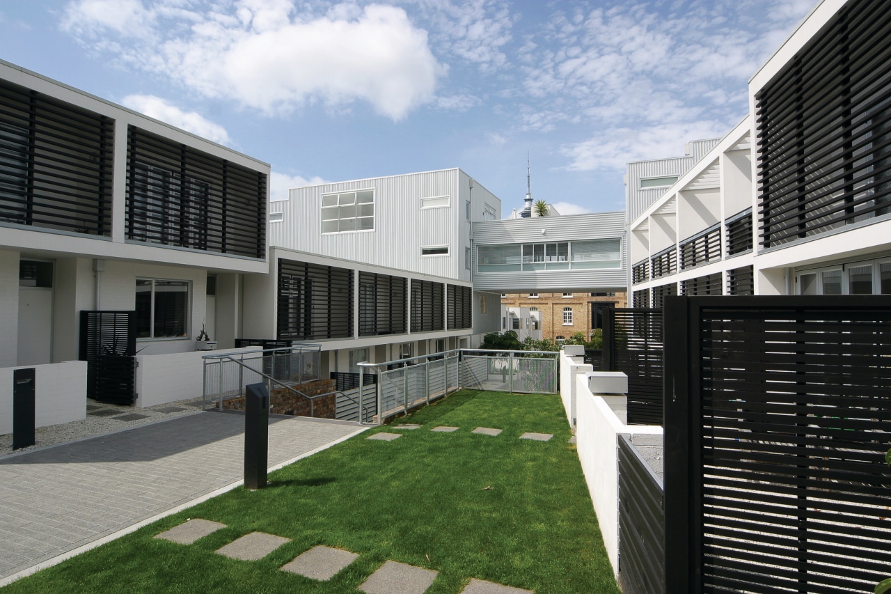 A view of the quality designed apartment complexes apartment, architecture, building, corporate headquarters, facade, home, house, mixed use, neighbourhood, property, real estate, residential area, black, white