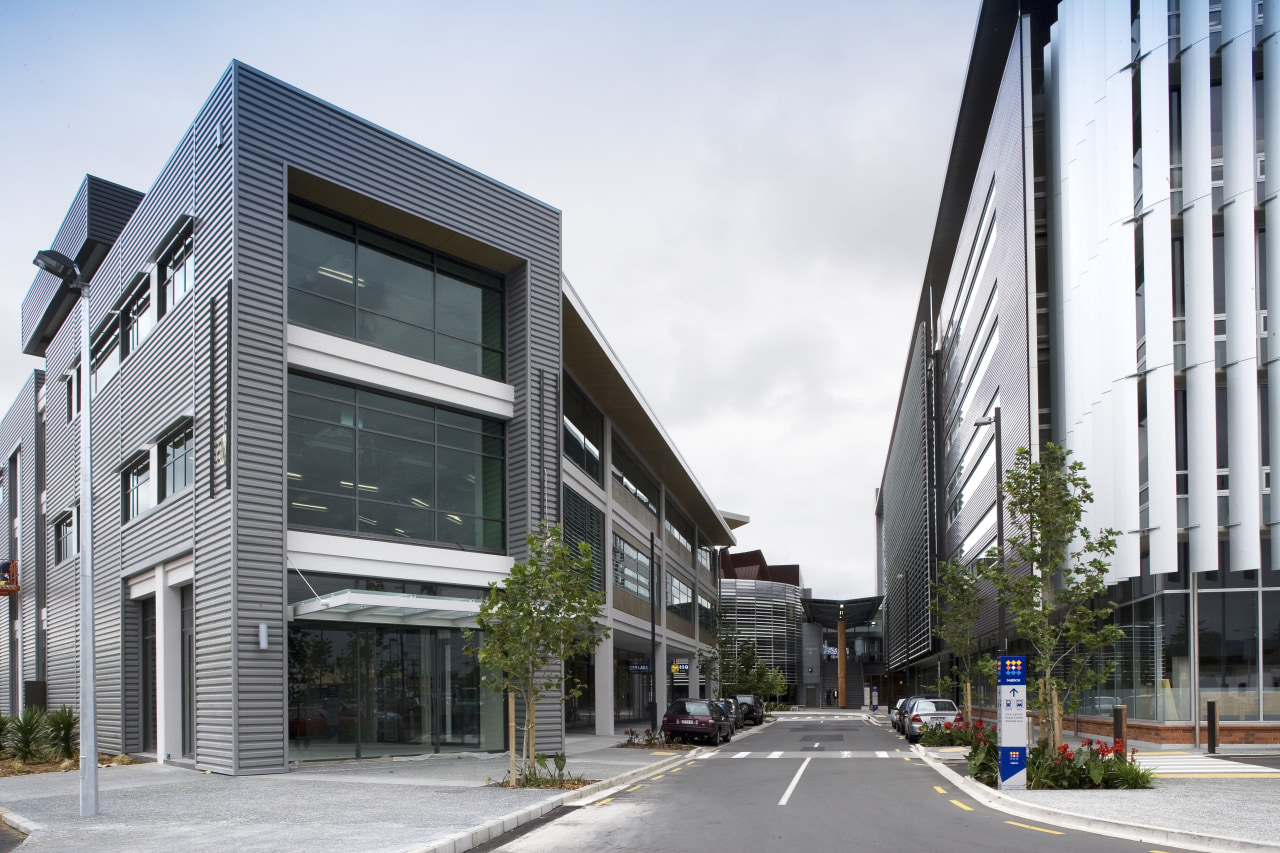View of the civic center featuring extensive glazing apartment, architecture, building, commercial building, condominium, corporate headquarters, facade, headquarters, house, metropolitan area, mixed use, neighbourhood, real estate, residential area, white