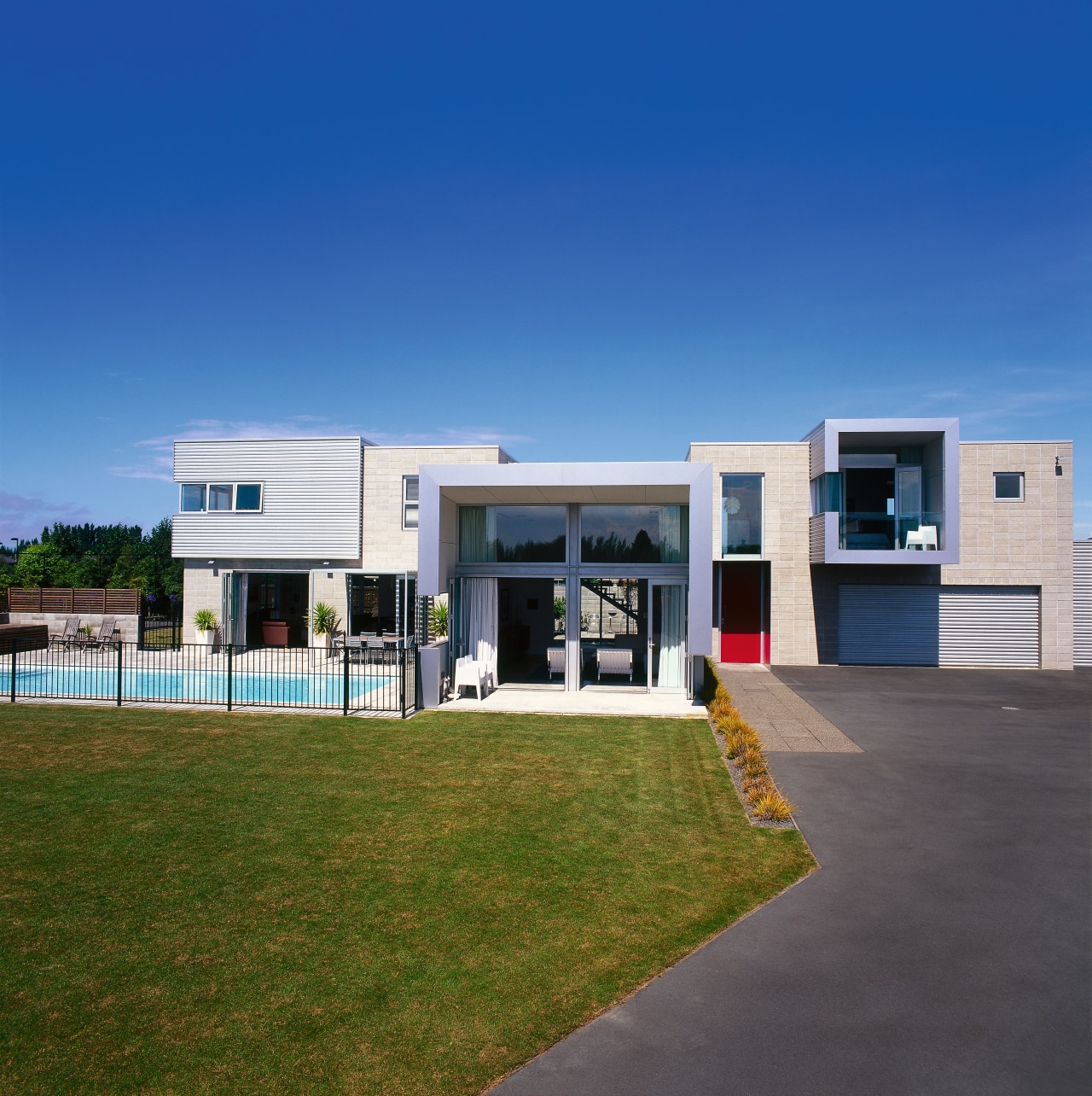 Exterior view of the house designed by Dalman architecture, corporate headquarters, elevation, facade, home, house, property, real estate, sky, blue