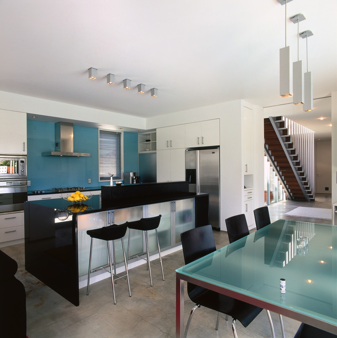 The lighting for this home was designed by architecture, interior design, kitchen, real estate, room, table, white