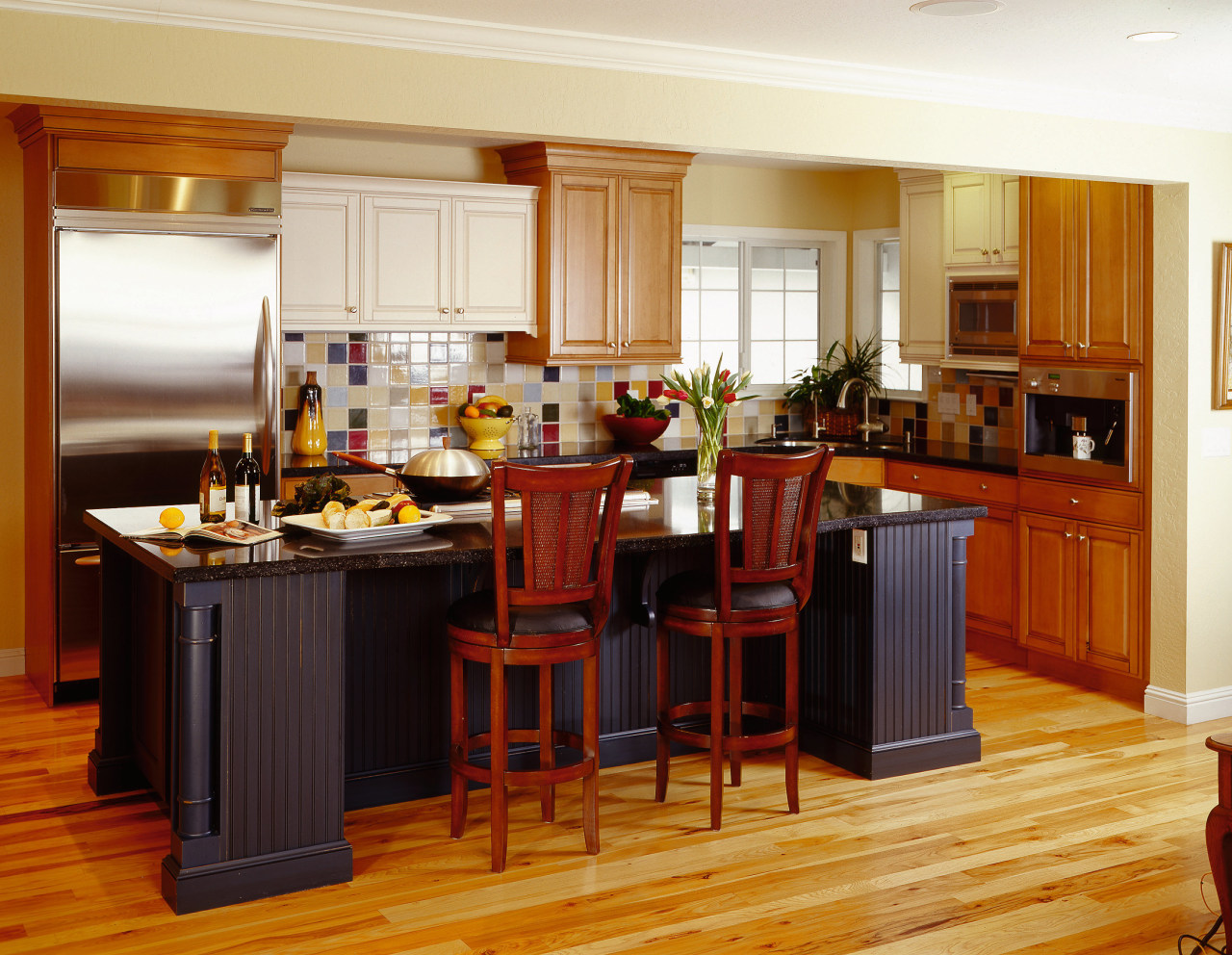 A view of a kitchen by NKBA. cabinetry, countertop, cuisine classique, dining room, floor, flooring, hardwood, interior design, kitchen, room, wood flooring, brown