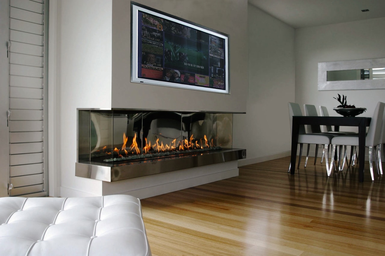 A view of a fireplace from Living Flame. fireplace, flooring, hearth, interior design, living room, gray