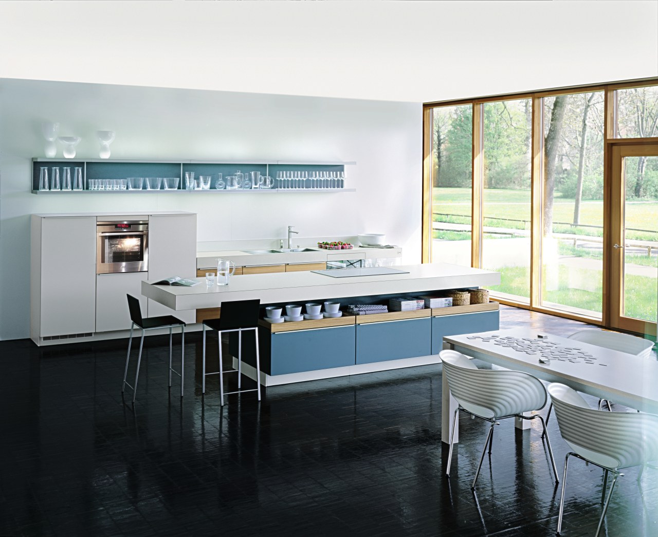 A view of some kitchen appliances from AEG. countertop, interior design, kitchen, room, window, white, black