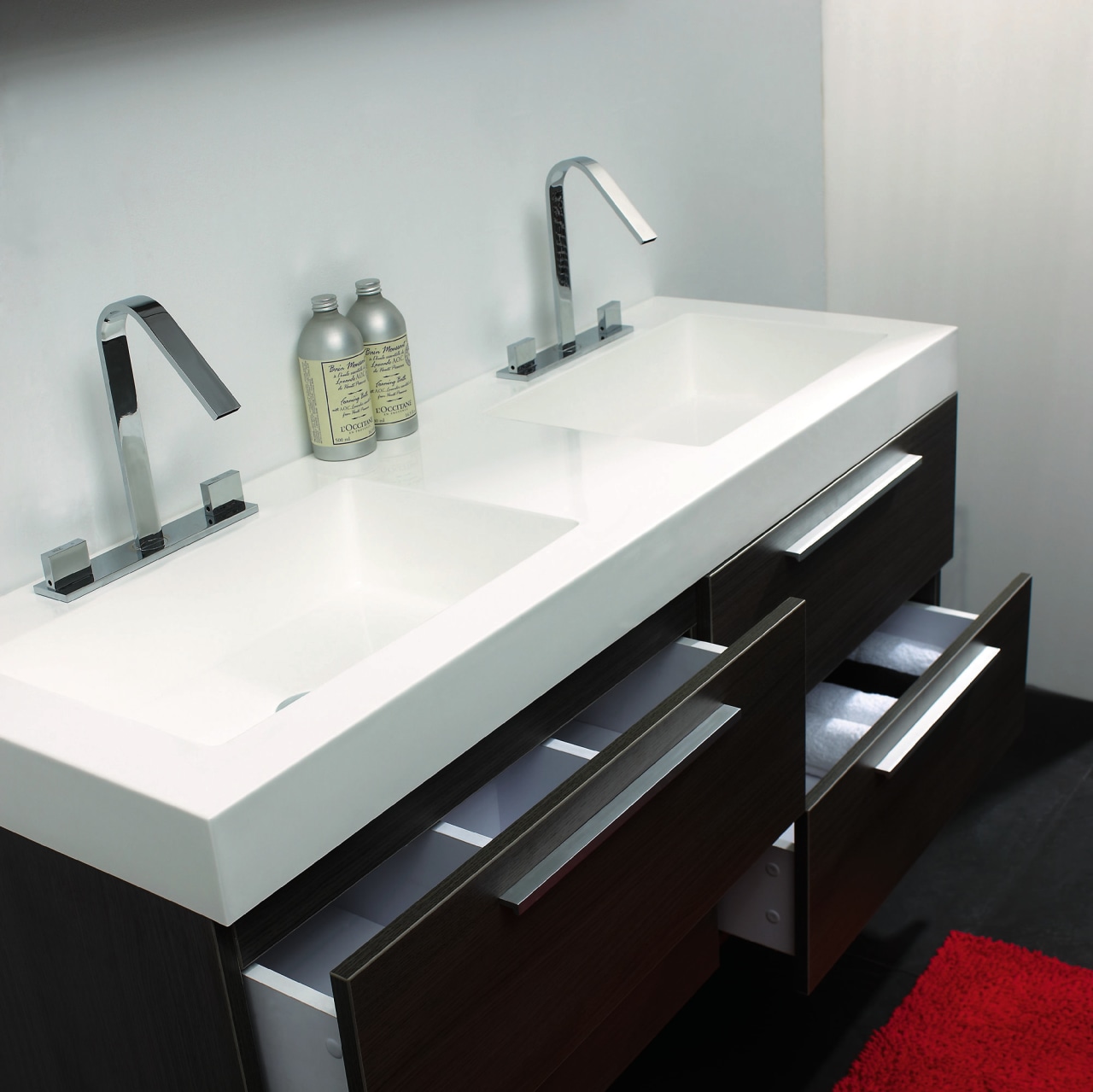 A view of a bathroom vanity from Tonusa. angle, bathroom, bathroom accessory, bathroom cabinet, bathroom sink, countertop, plumbing fixture, product design, sink, tap, gray, black