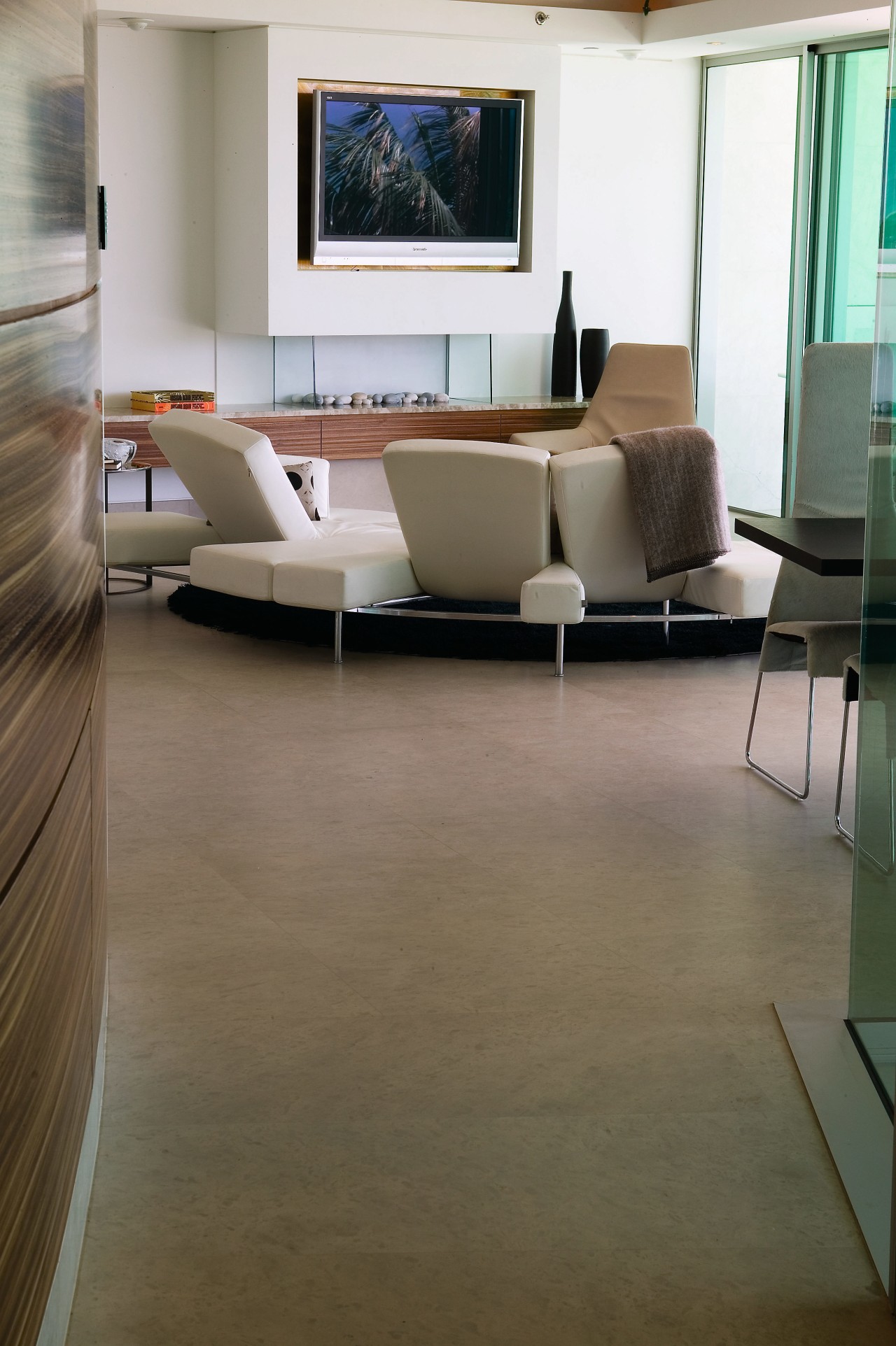 A view of this apartment featuring zMonaco Brown floor, flooring, furniture, hardwood, interior design, laminate flooring, living room, table, tile, wood, wood flooring, brown, gray