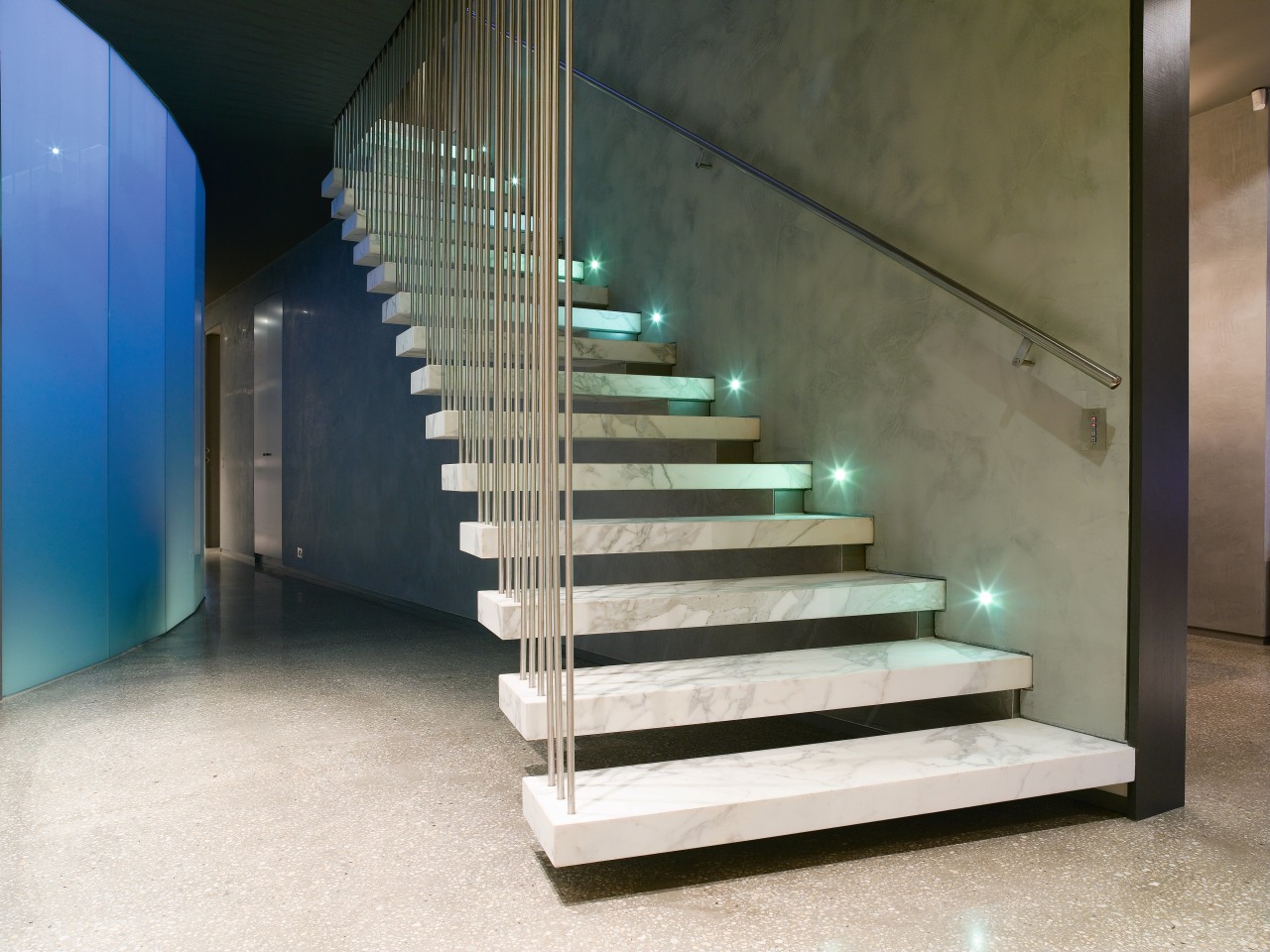 A view of the staircase, polished concrete flooring handrail, interior design, stairs, black, white