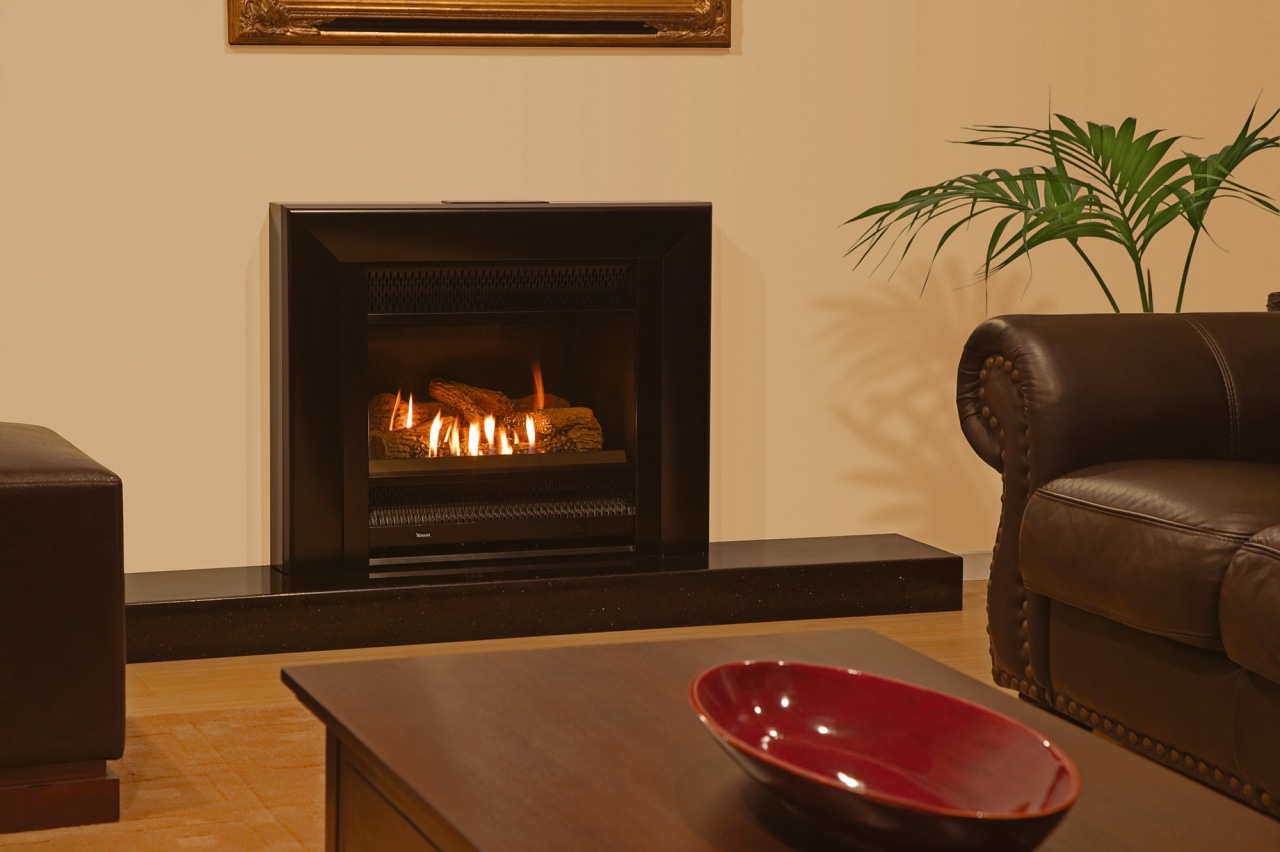 A view of a fireplace from Rinai. fireplace, hearth, heat, home appliance, wood burning stove, brown, orange