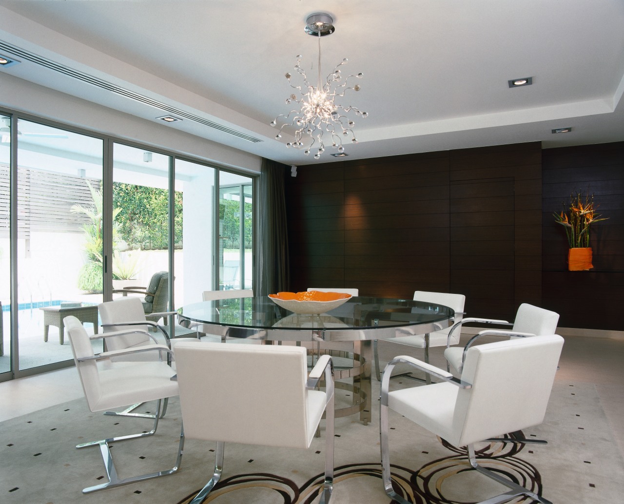 A view of the dining room feature teak ceiling, dining room, interior design, living room, real estate, table, gray