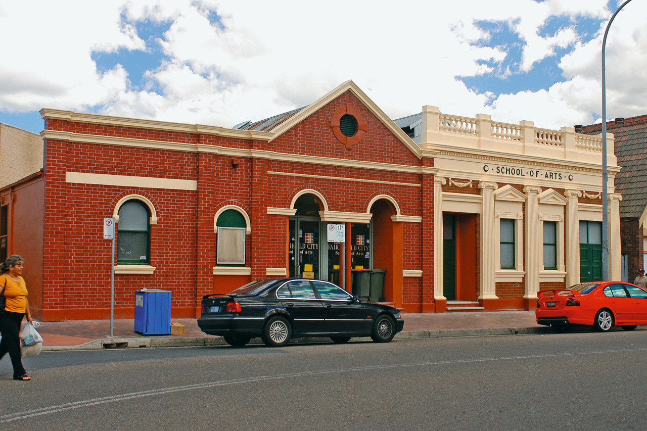 A view of an exterior restoration carried out architecture, building, car, city, downtown, facade, family car, house, landmark, metropolitan area, neighbourhood, property, real estate, residential area, sky, town, vehicle