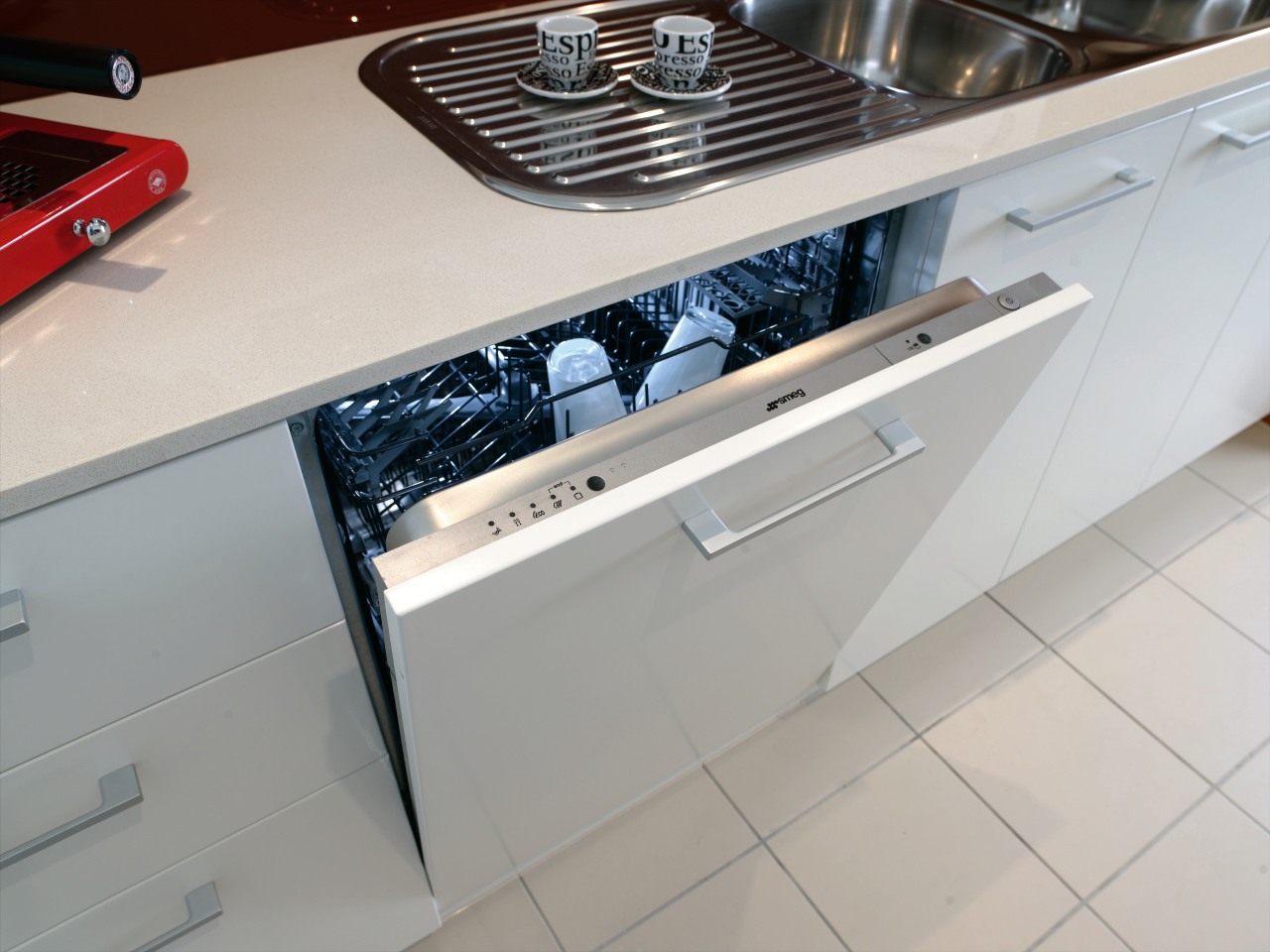 The intergrated dishwasher helps to give the kitchen automotive exterior, countertop, floor, home appliance, kitchen, kitchen stove, major appliance, gray