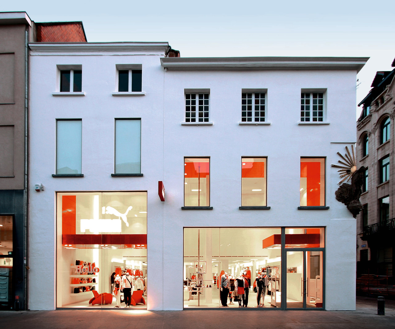 An exterior viow of the puma shopfront,  architecture, building, facade, house, window, teal