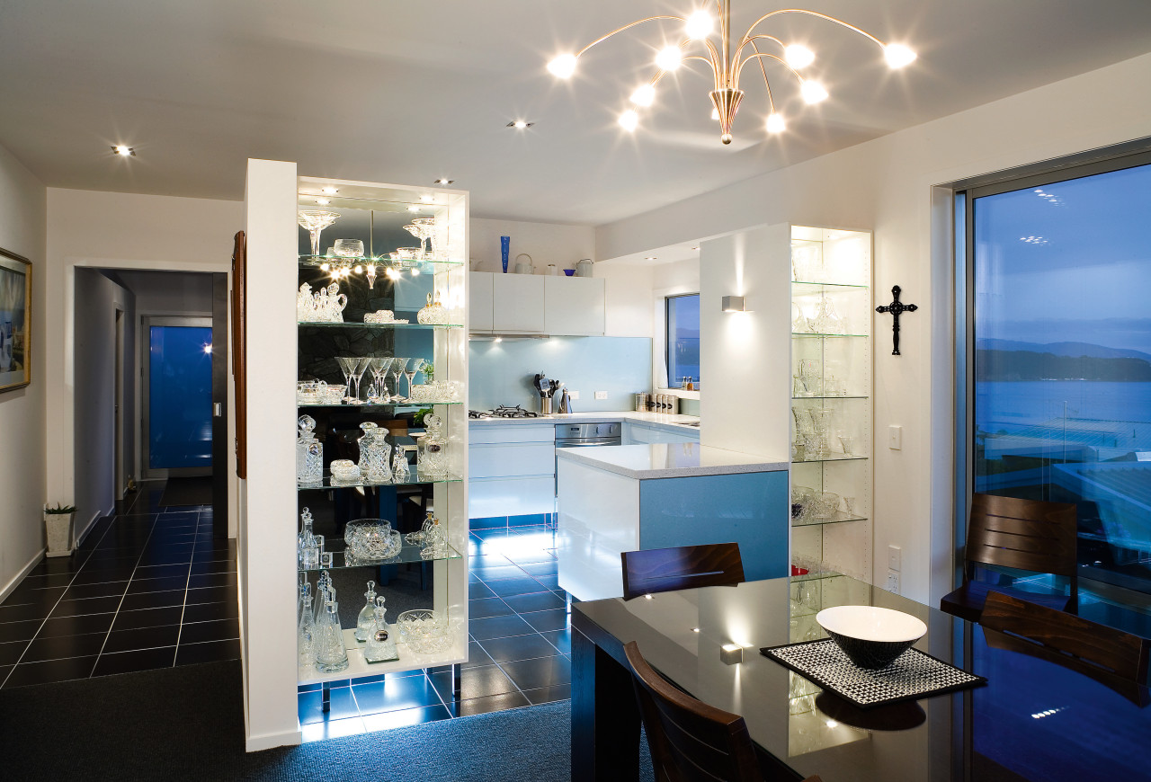 A view of this kitchen featuring tiled flooring, interior design, kitchen, real estate, room, gray