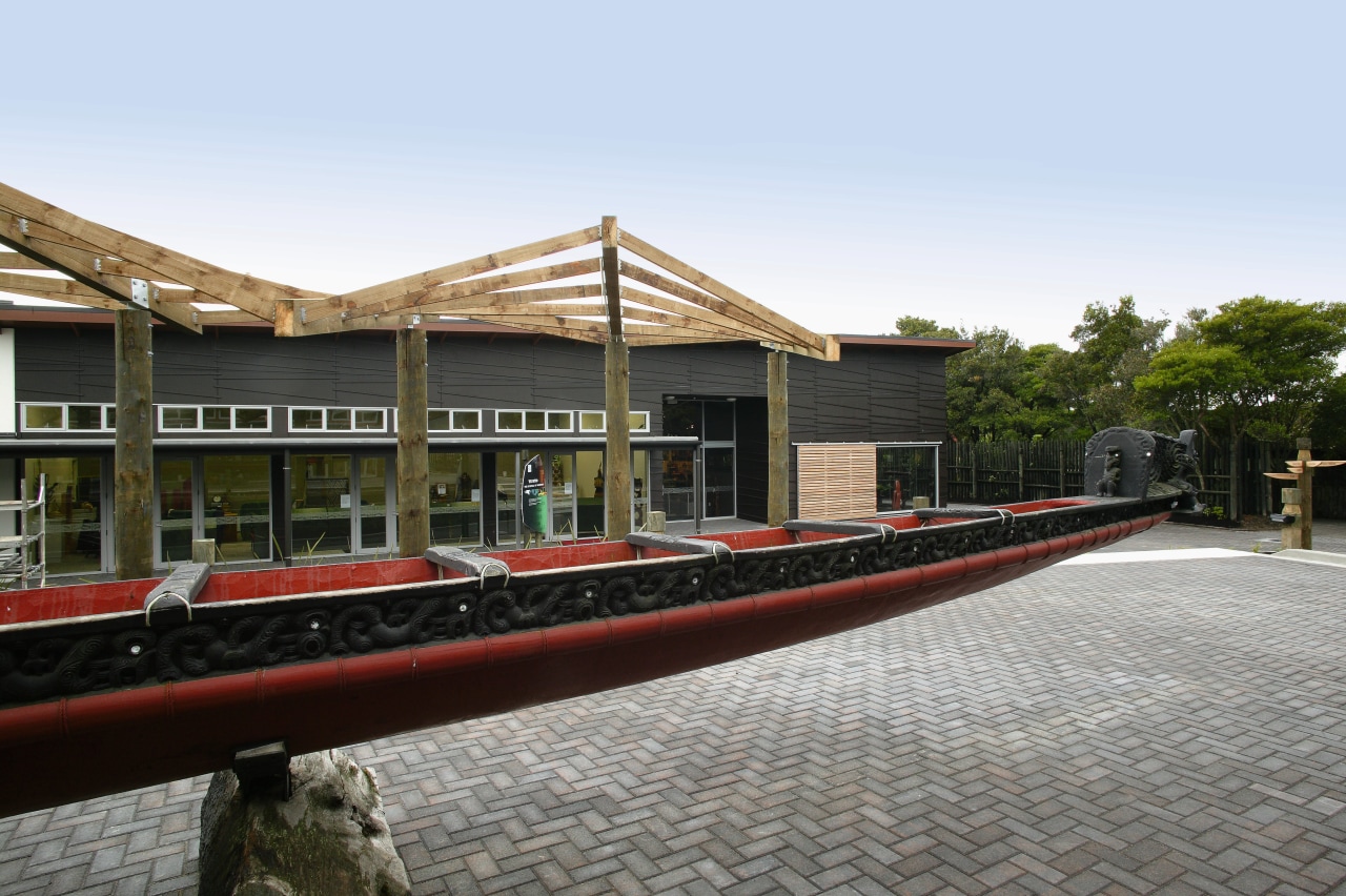 A view of the Te Puia Marae built building, white, gray
