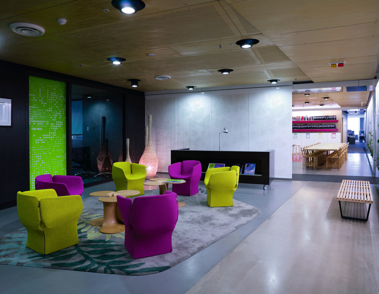 A view of this office breakout area featuring architecture, ceiling, interior design, lobby, table, gray