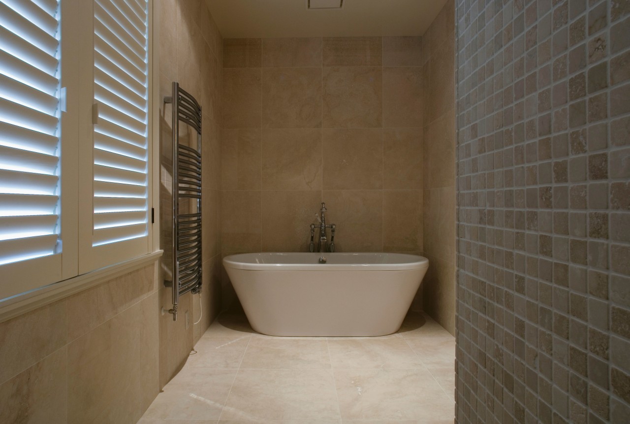 A view of the NKBA Award wining bathroom bathroom, floor, flooring, interior design, plumbing fixture, property, real estate, room, tile, wall, brown, gray