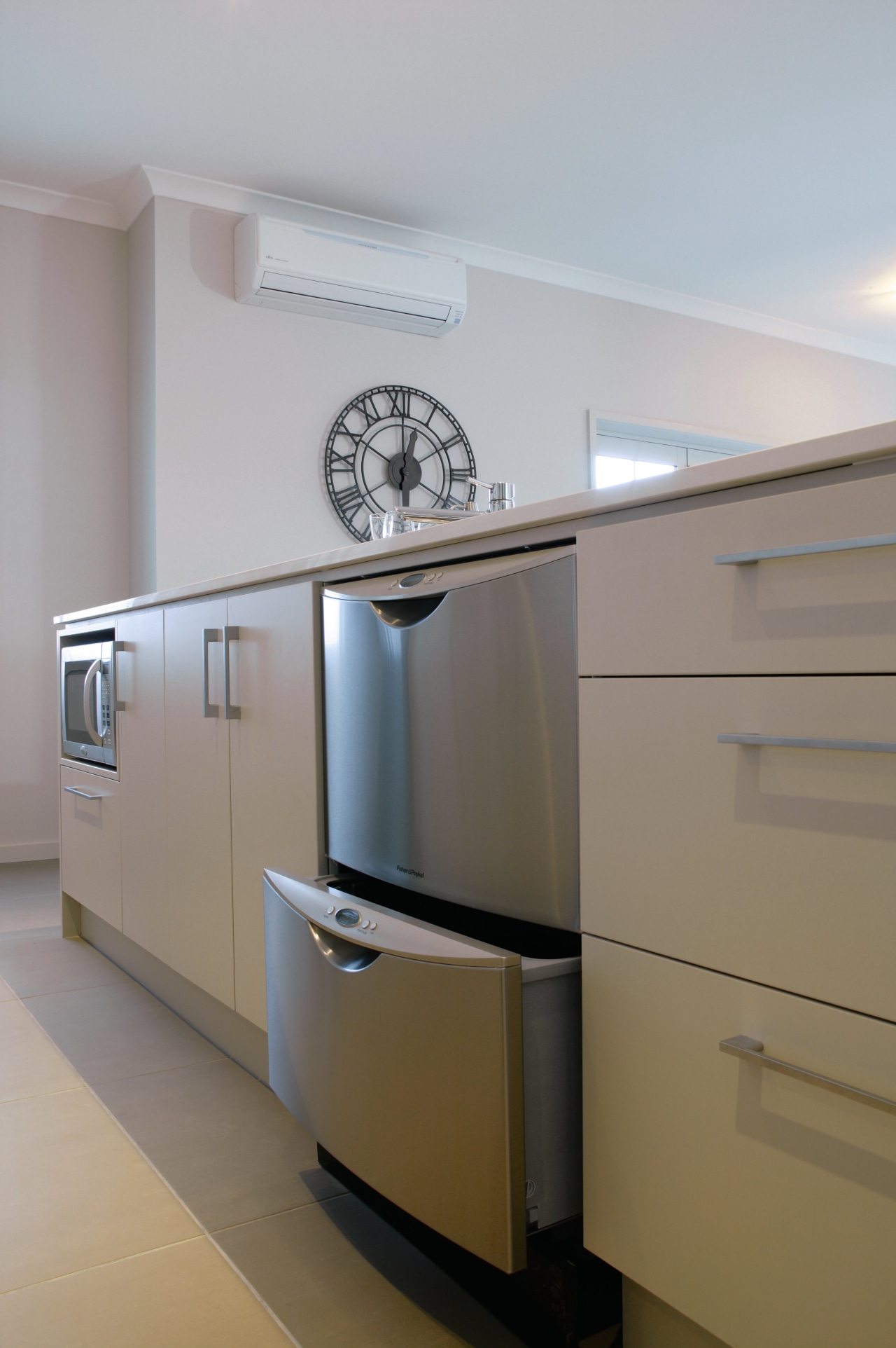 A view of some kitchen appliances from Fisher architecture, cabinetry, furniture, home, interior design, kitchen, product design, wall, gray