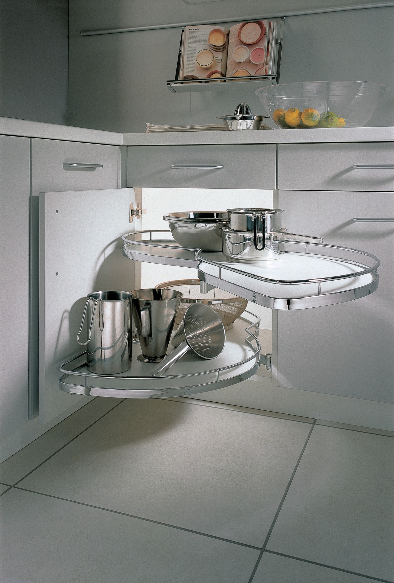 A view of this kitchen featuring cabinetry and countertop, furniture, interior design, kitchen, product, product design, sink, tap, gray