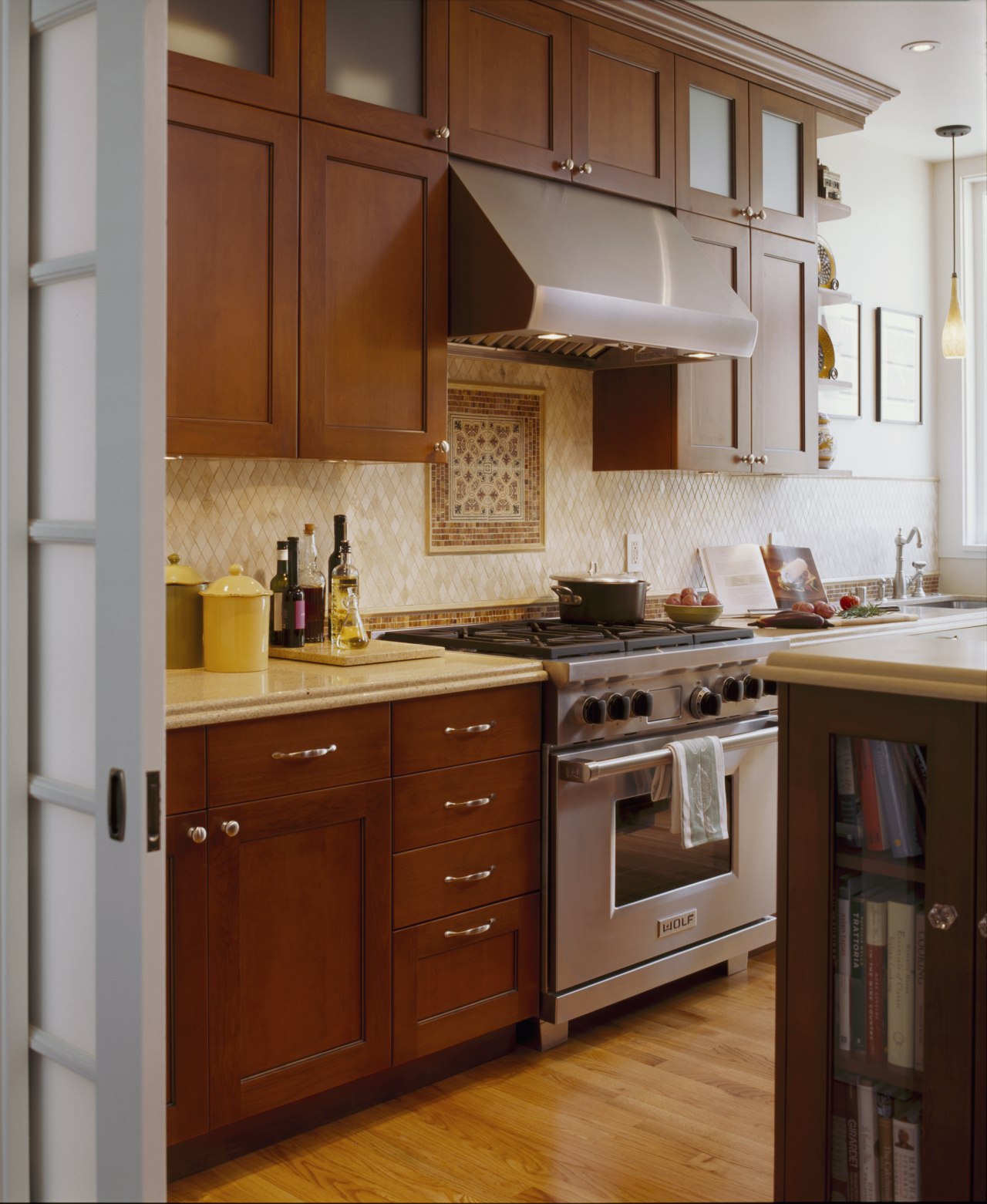 A view of a kitchen designed by Templer cabinetry, countertop, cuisine classique, flooring, furniture, hardwood, home appliance, interior design, kitchen, room, wood, brown, gray