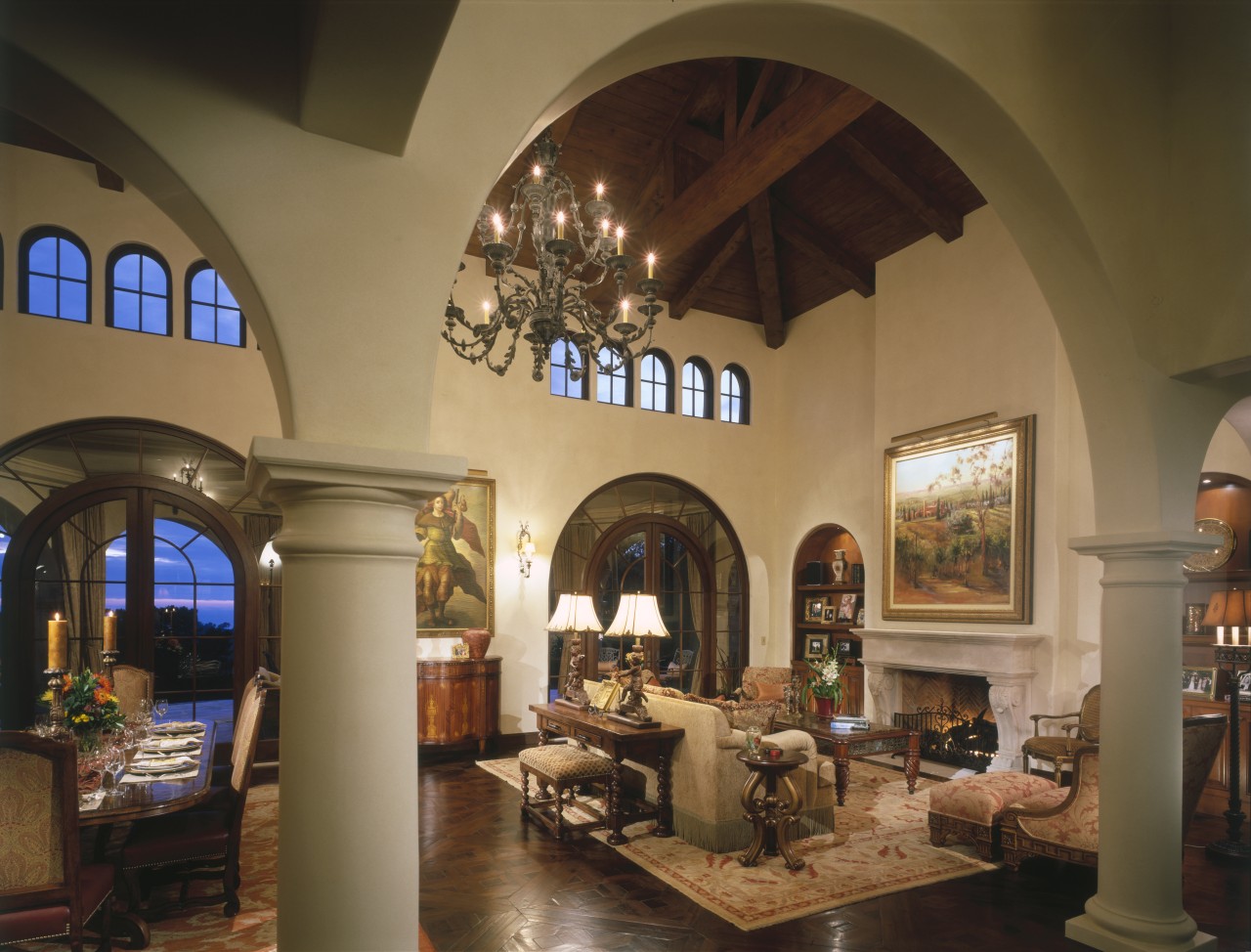 A view of the living area featuring covered arch, ceiling, estate, hacienda, home, interior design, living room, lobby, brown