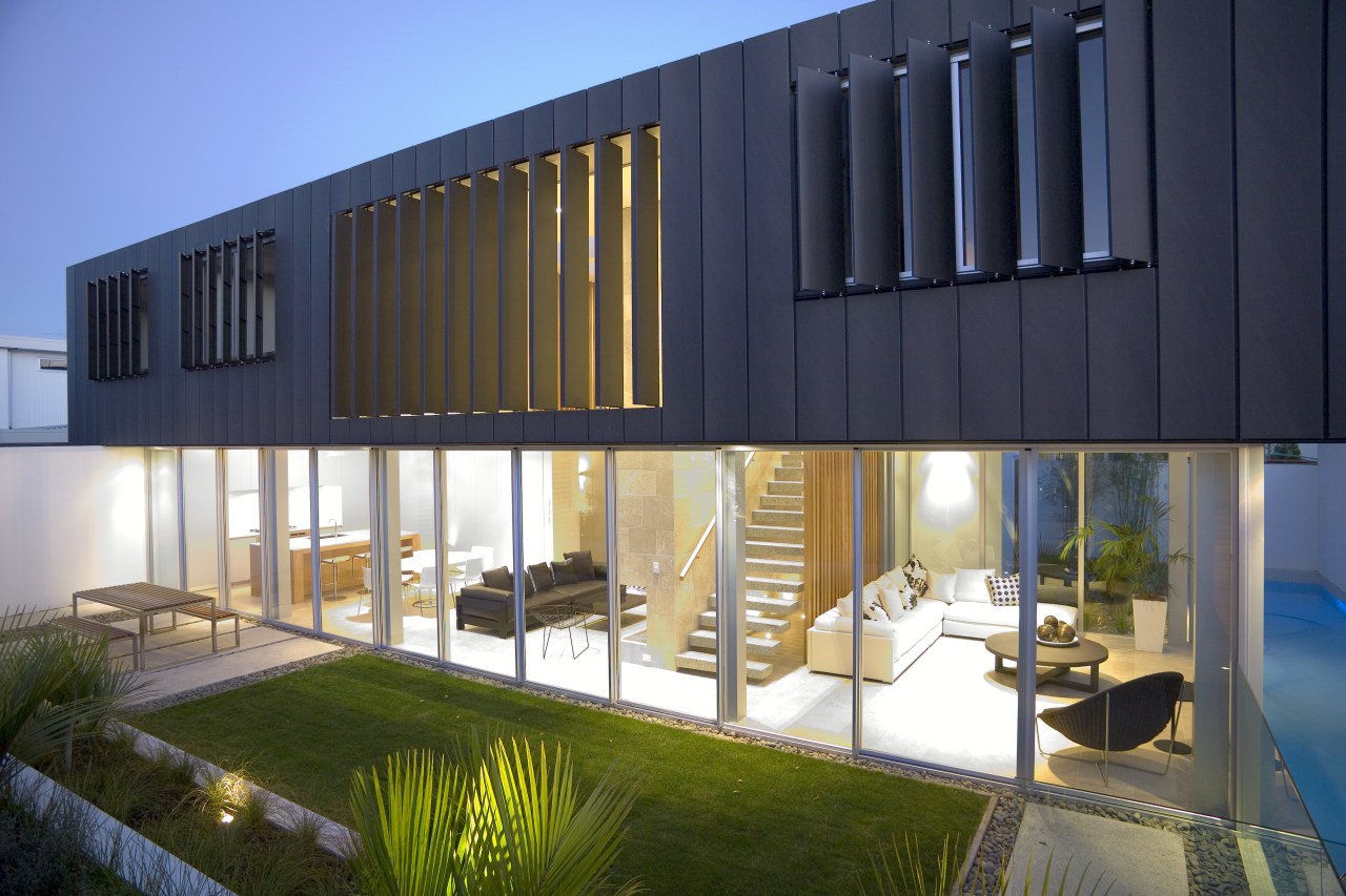 A walled courtyard garden and a fully glazed architecture, estate, facade, home, house, property, real estate, window, blue