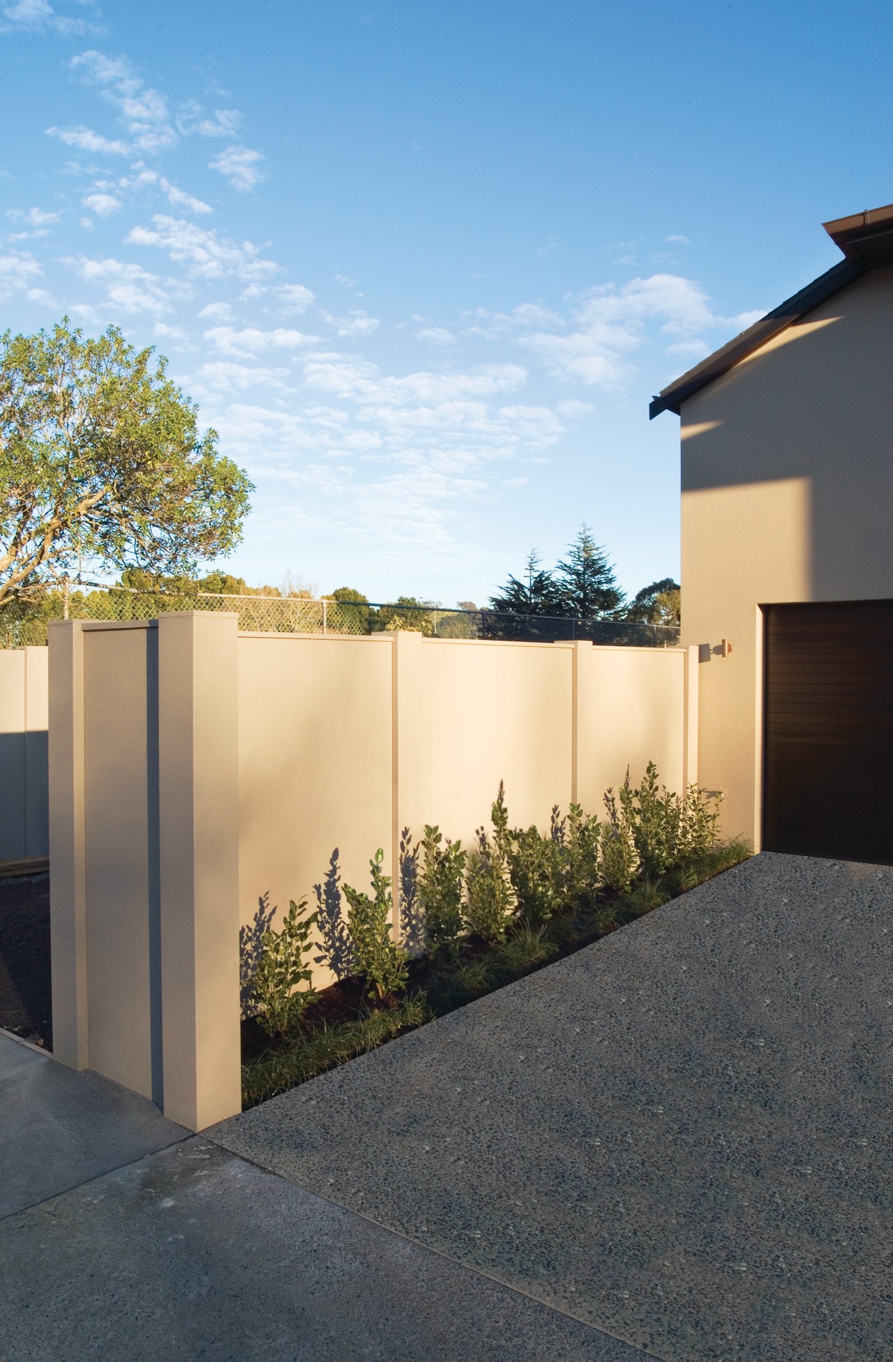 A view of the Panelrock modular wall system architecture, courtyard, estate, facade, fence, home, house, property, real estate, residential area, wall, yard