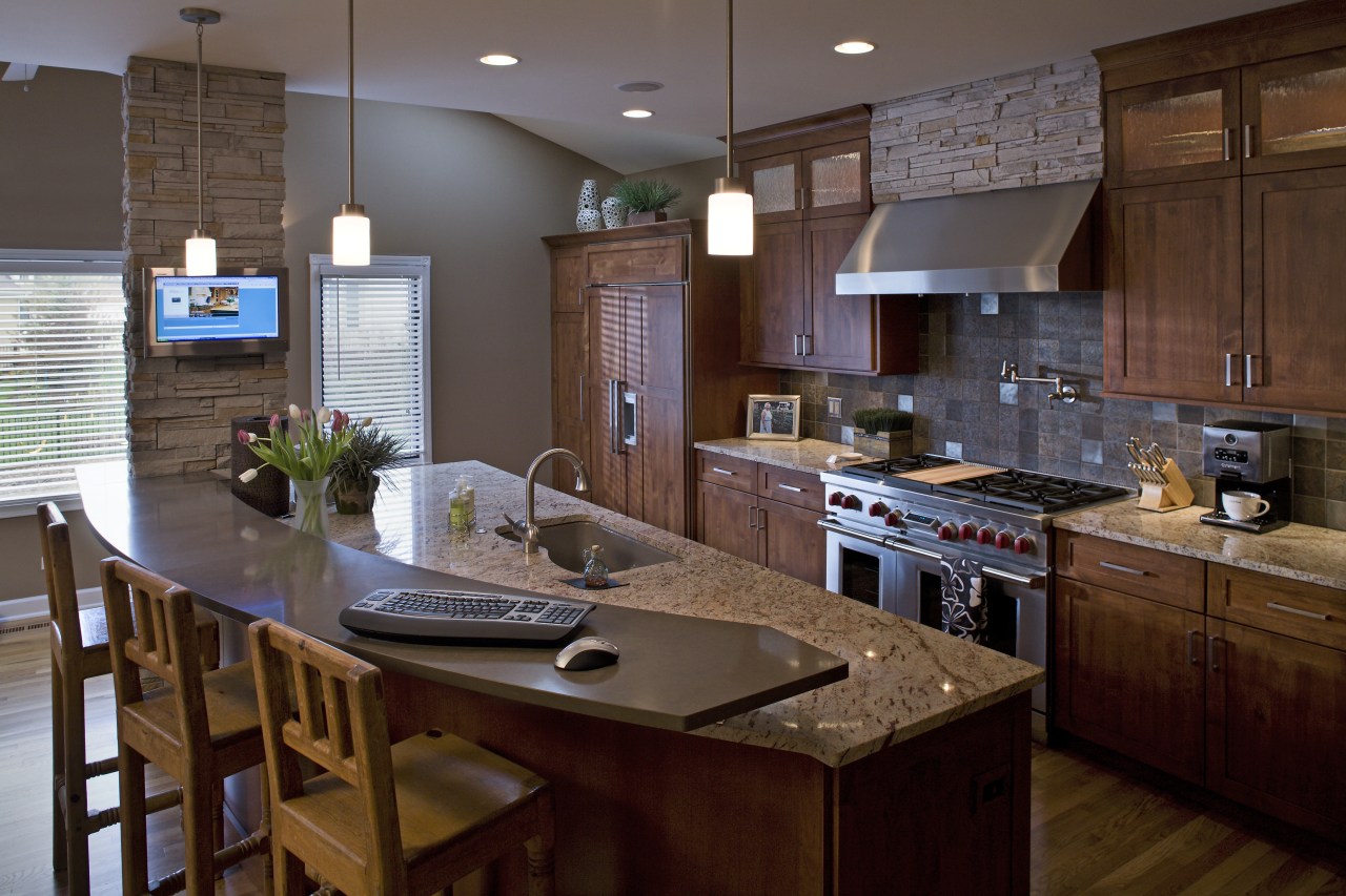 A view of a kitchen designed by Drury cabinetry, countertop, cuisine classique, interior design, kitchen, real estate, room, brown, gray