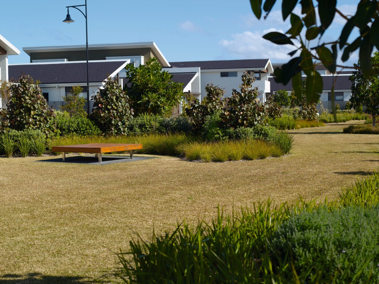 A view of these landscaped gardens and pool cottage, estate, grass, home, house, land lot, landscape, lawn, plant, property, real estate, residential area, tree, yard, brown