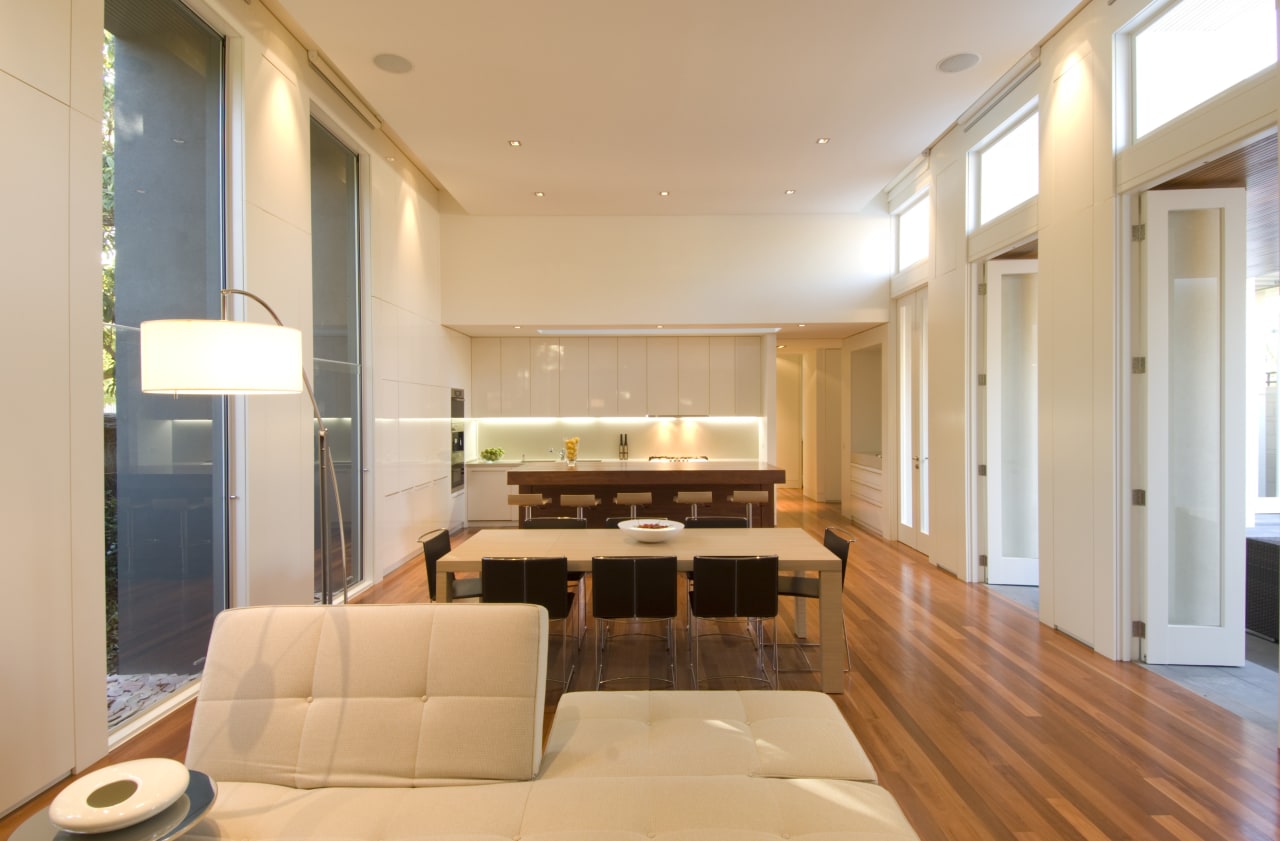 A view of this kitchen featuring the latest ceiling, floor, flooring, interior design, living room, real estate, room, window, orange, gray