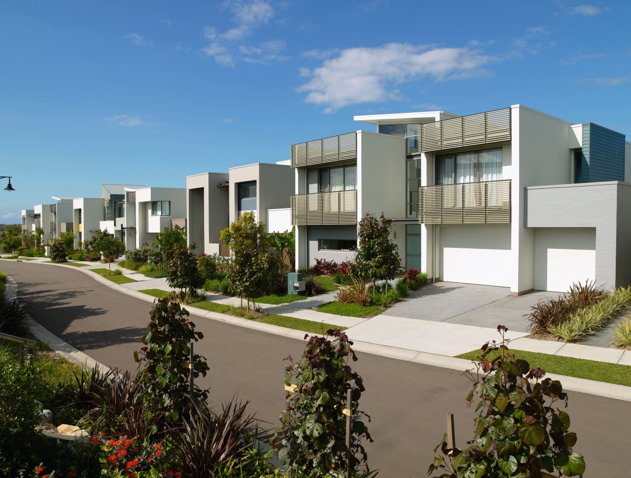 Ab exterior view of the Magenta shores holiday/residential apartment, architecture, building, condominium, corporate headquarters, elevation, estate, home, house, metropolitan area, mixed use, neighbourhood, property, real estate, residential area, villa, teal