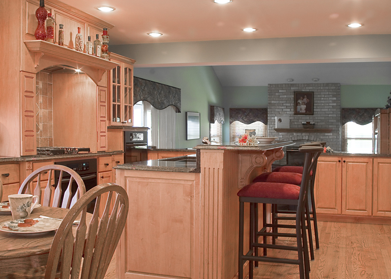 A view of this kitchen designed by Designer cabinetry, countertop, cuisine classique, floor, flooring, hardwood, home, interior design, kitchen, real estate, room, wood, wood flooring, orange