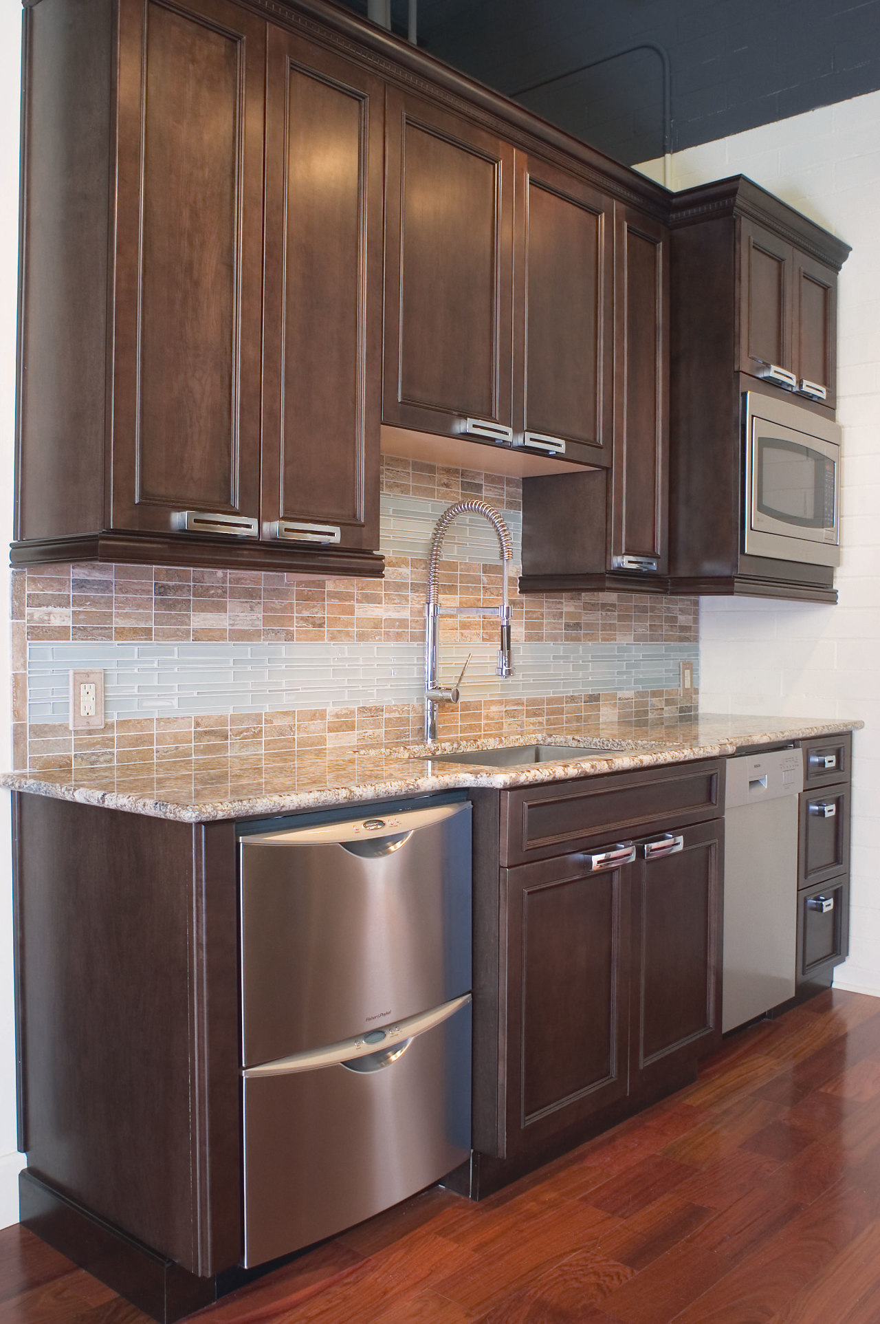 A view of these kitchens designed by Kitchen cabinetry, countertop, cuisine classique, furniture, hardwood, home appliance, kitchen, room, wood stain, red, black, gray