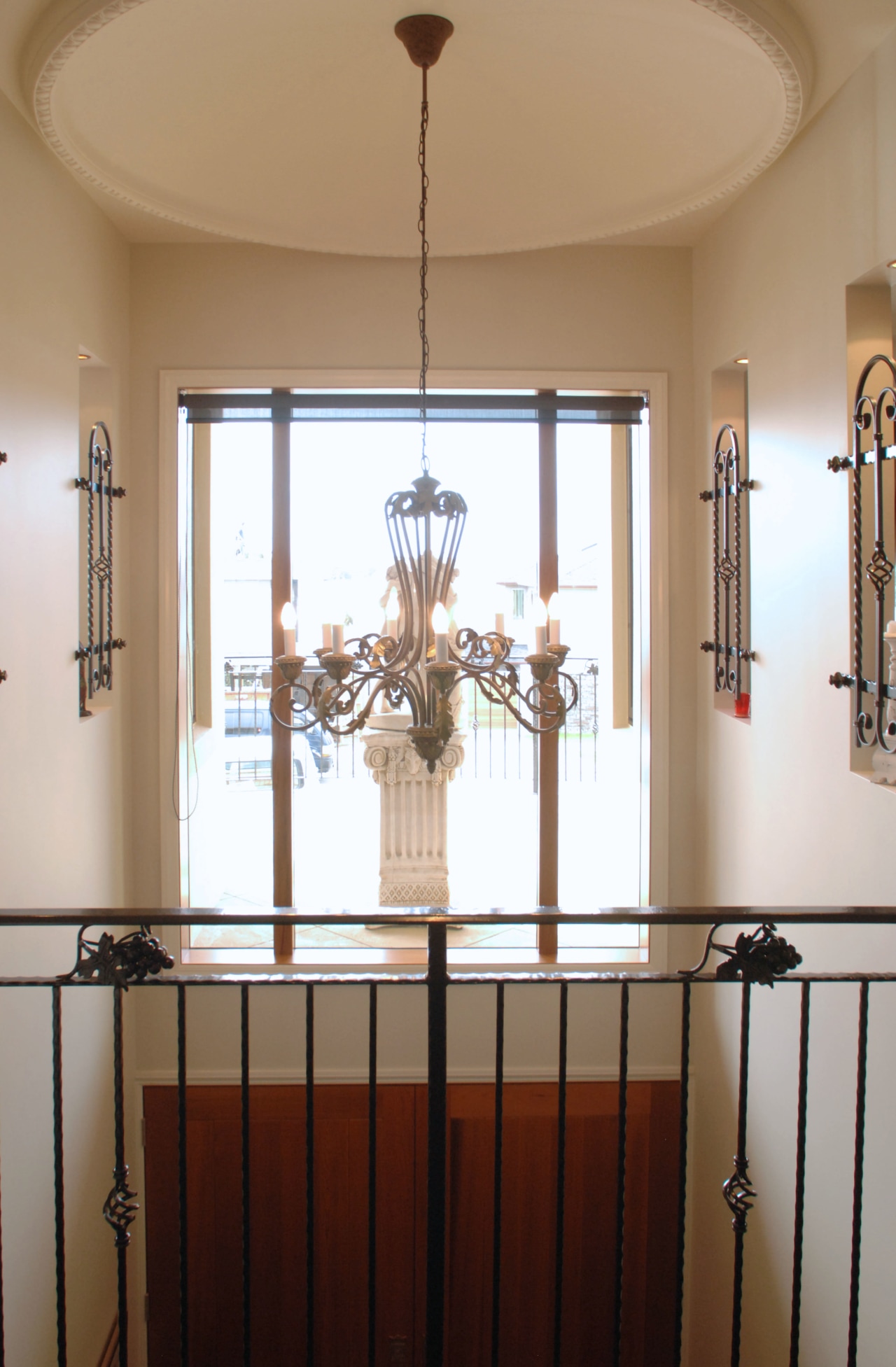 A view of a home designed by MF baluster, door, glass, handrail, home, interior design, iron, light fixture, wall, window, brown