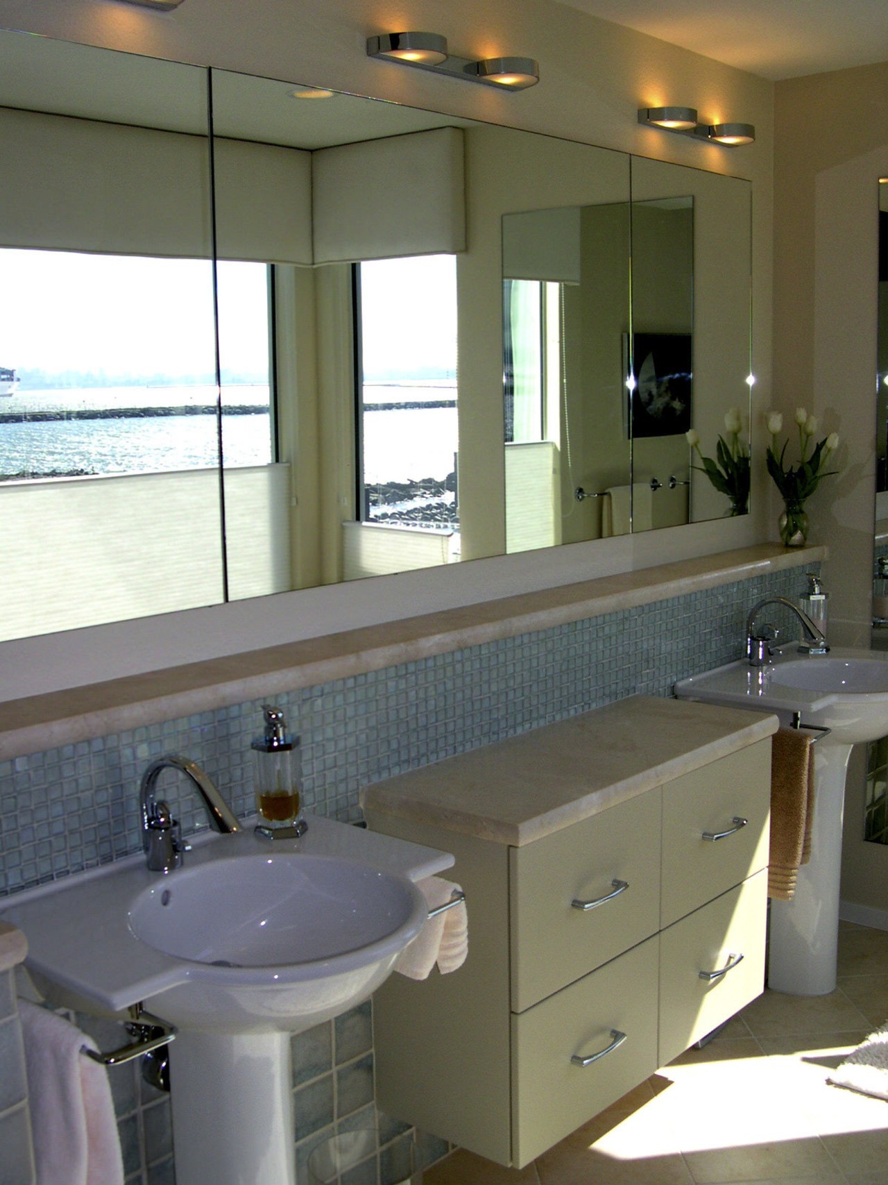 A view of some bathroomware from NKBA. bathroom, bathroom accessory, cabinetry, countertop, home, interior design, kitchen, room, sink, window, gray, brown