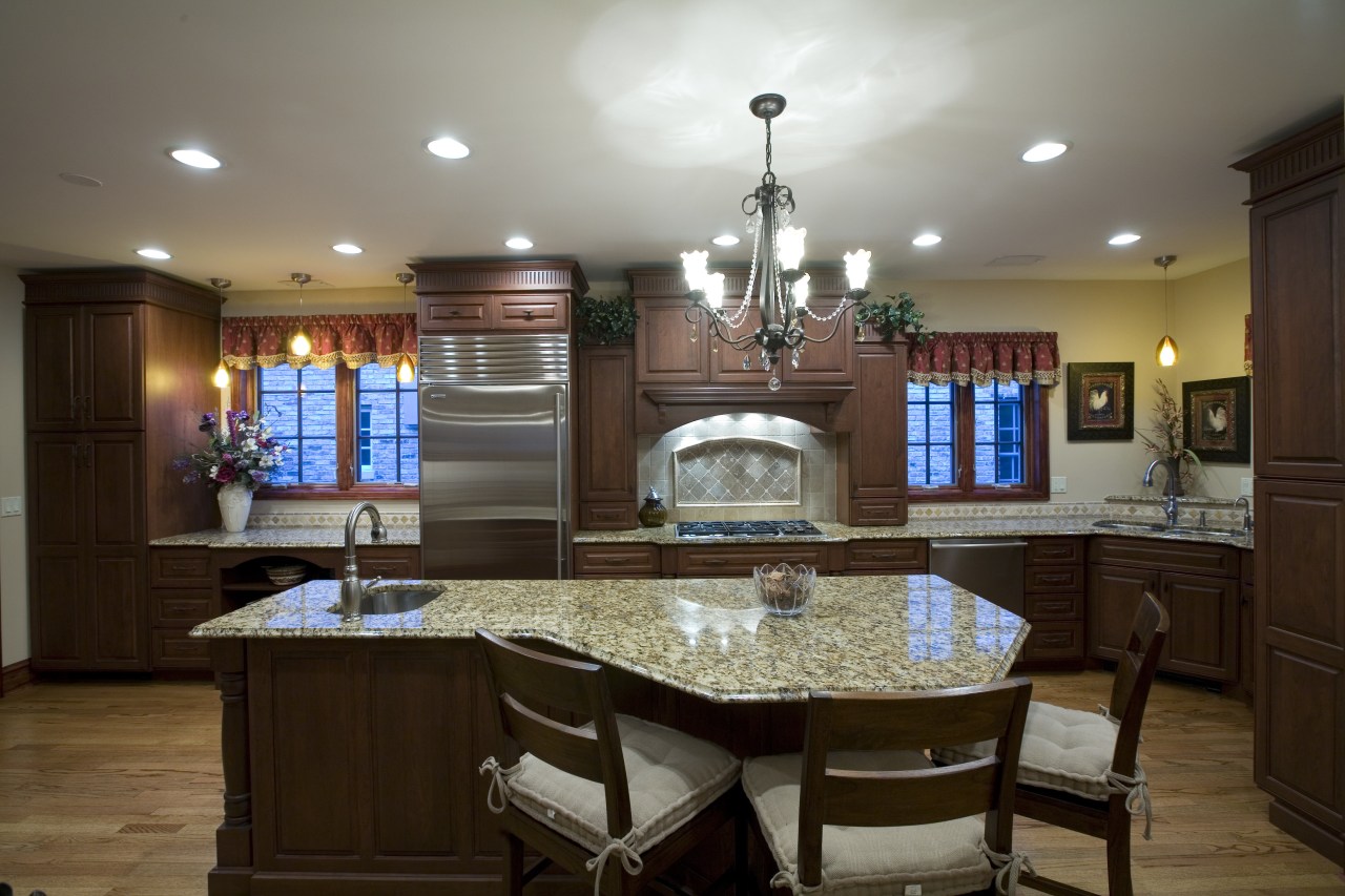 A view of this remodelled kitchen designed by cabinetry, ceiling, countertop, cuisine classique, dining room, estate, home, interior design, kitchen, room, gray, brown