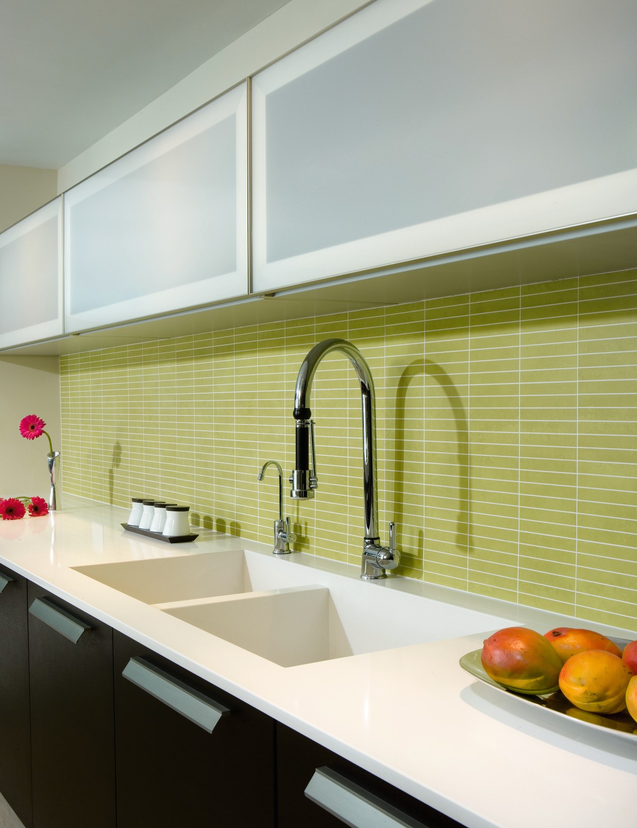 A view of the sleek kitchen  featturing countertop, interior design, kitchen, sink, gray