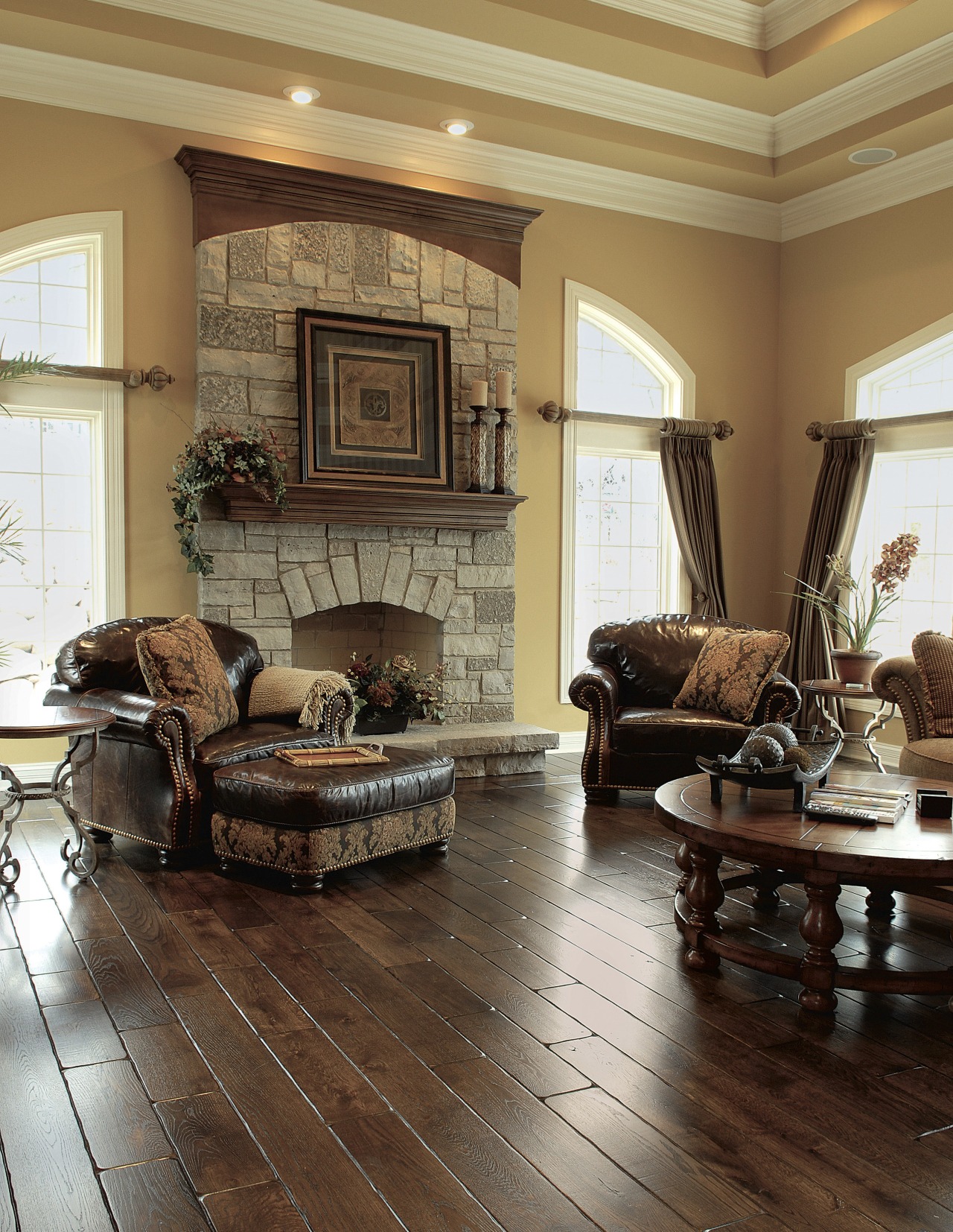 A view of these interior living areas featuring ceiling, estate, floor, flooring, furniture, hardwood, home, interior design, laminate flooring, living room, loveseat, real estate, room, wall, window, wood, wood flooring, wood stain, brown