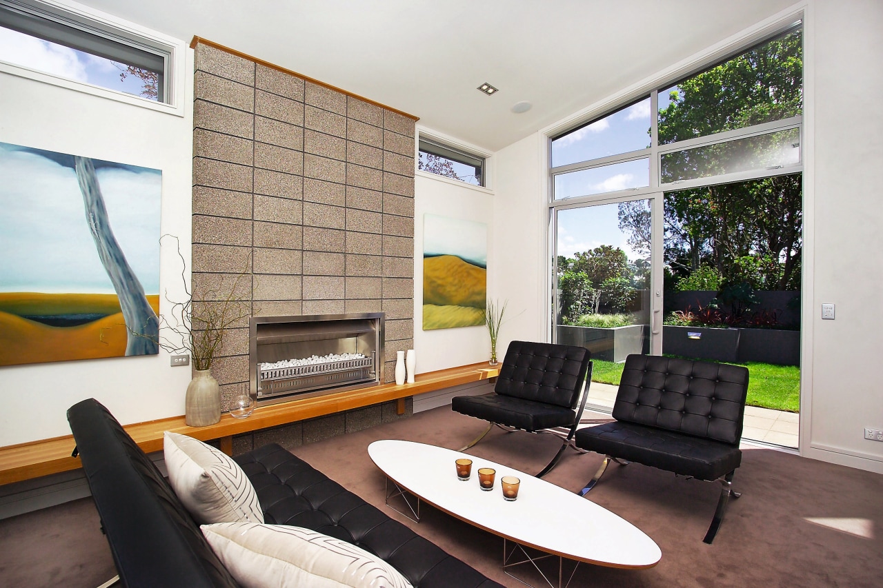 A view of this retro living area that architecture, house, interior design, living room, real estate, window, white