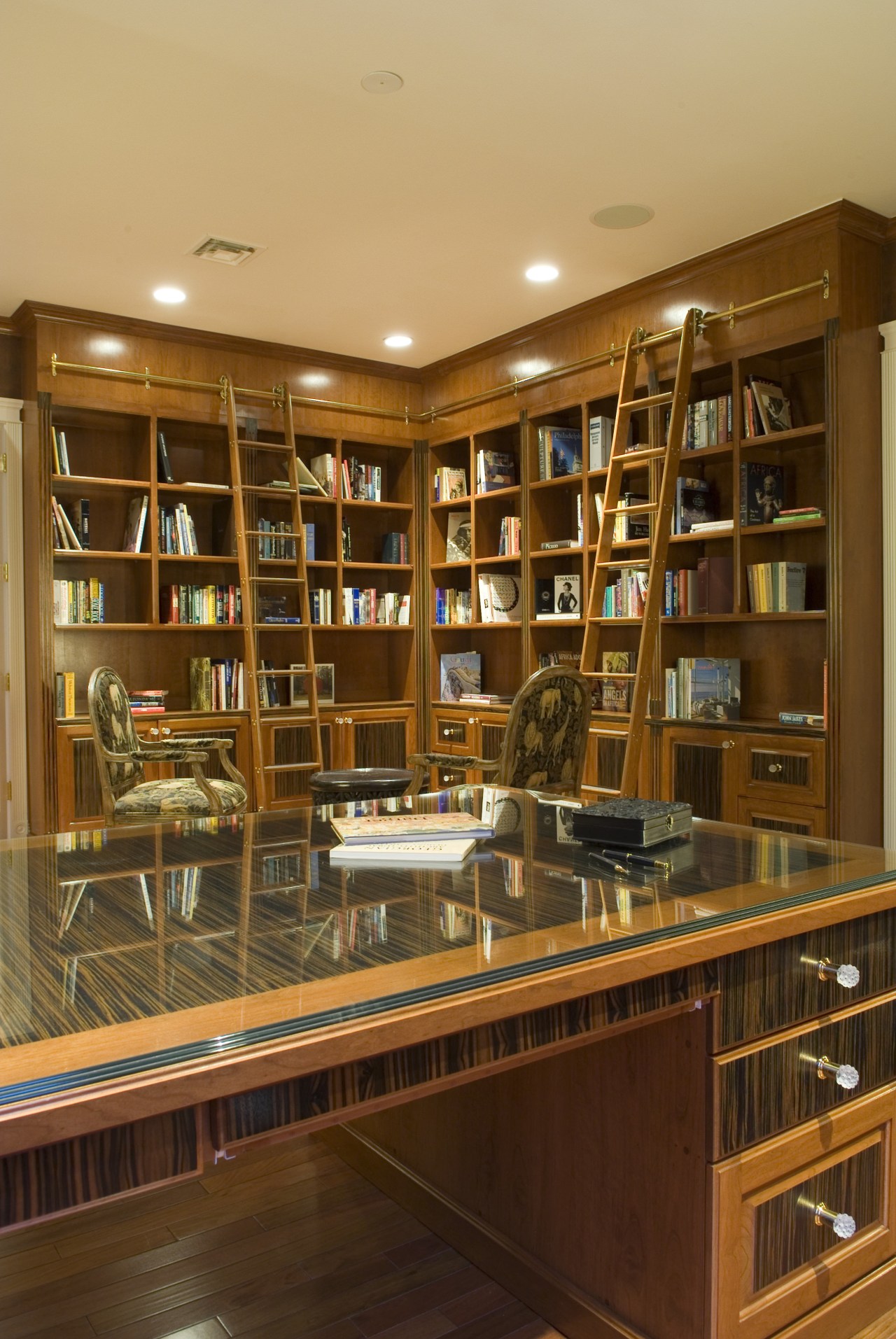 Custom Design Cabinets designed and fabricated the cabinets bookcase, bookselling, cabinetry, furniture, institution, library, library science, liquor store, public library, shelf, shelving, brown, orange