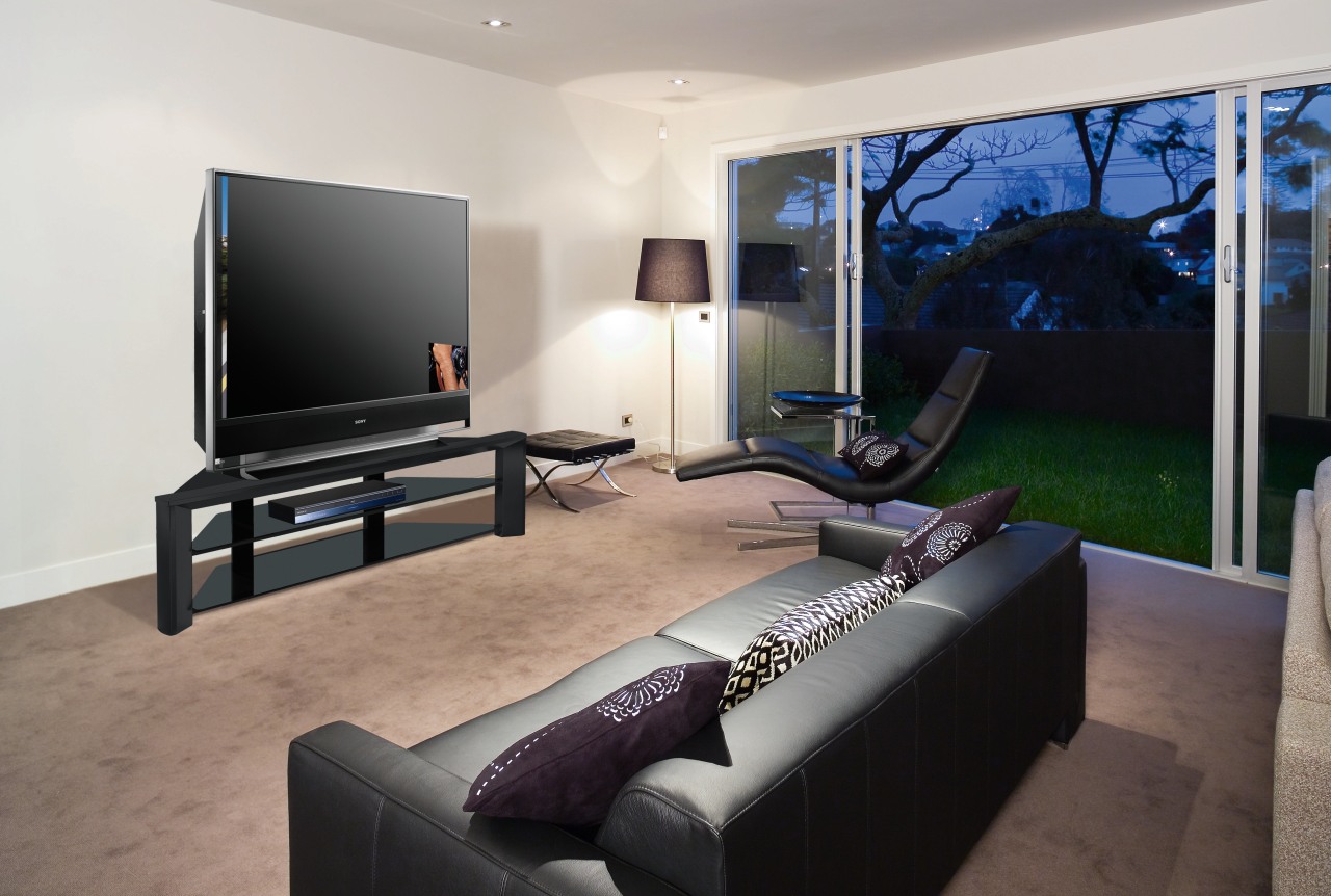 A view of a home theatre system from furniture, interior design, living room, real estate, room, gray, black