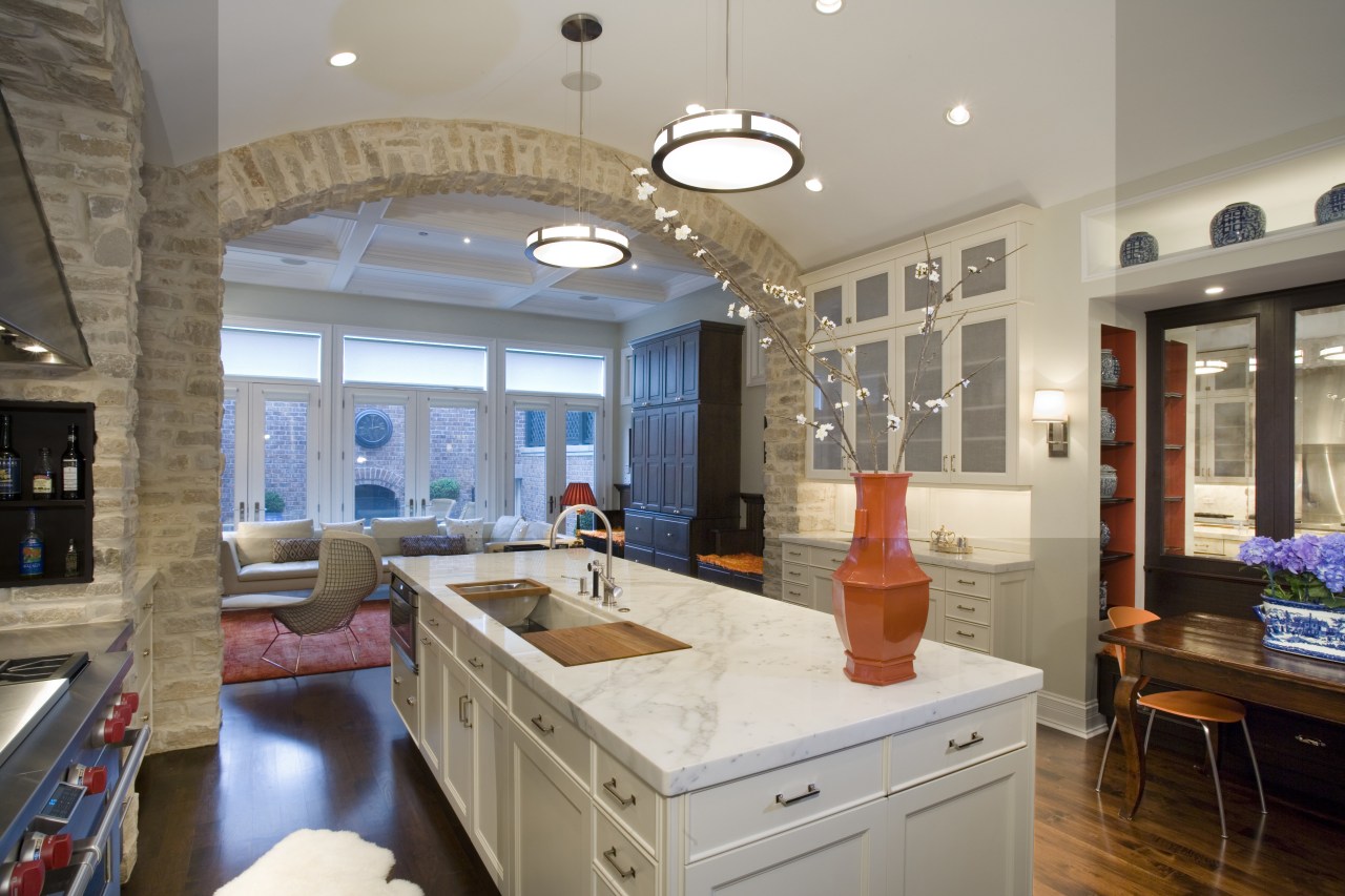 View of kitchen featuring wooden floor, cabinetry, marble ceiling, countertop, home, interior design, kitchen, living room, real estate, room, window, gray