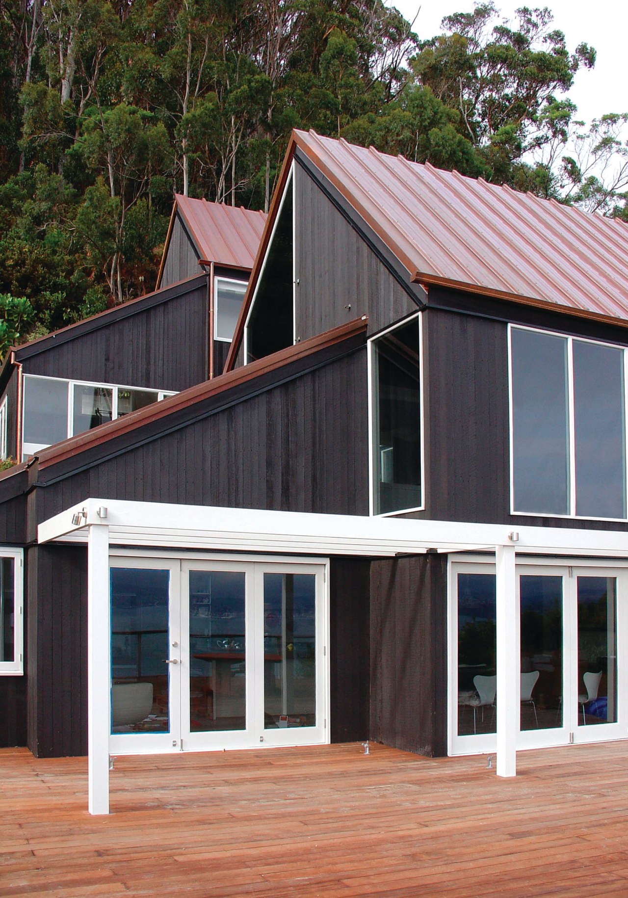 A view of some exterior paint from Resene. cottage, facade, home, house, real estate, roof, shed, siding, window, wood, black