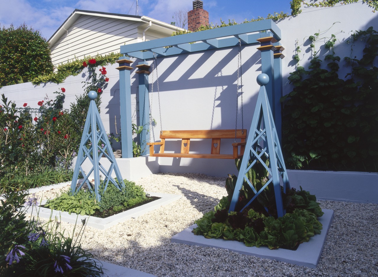An exterior view of the garden area, pavers, home, house, outdoor structure