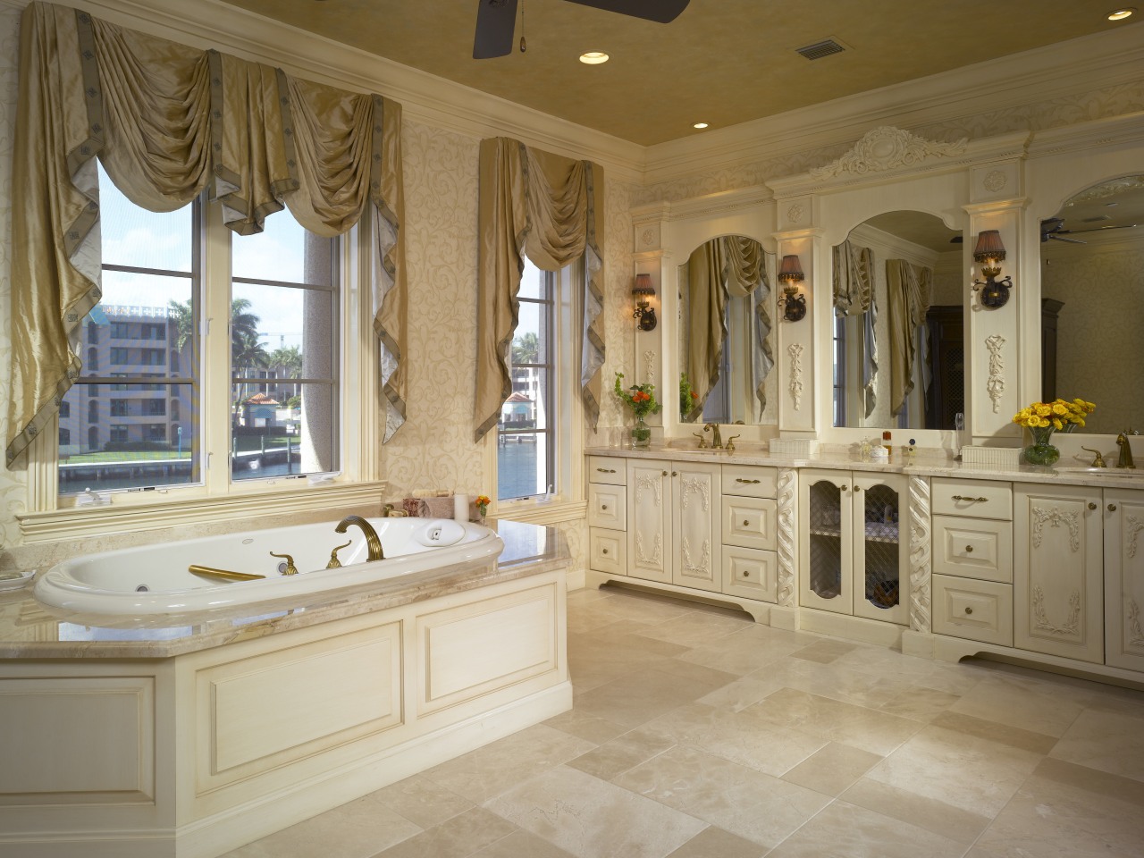 View of the master bathroom featuring a handcarved bathroom, cabinetry, ceiling, countertop, estate, floor, flooring, home, interior design, room, tile, wall, window, wood flooring, brown, orange