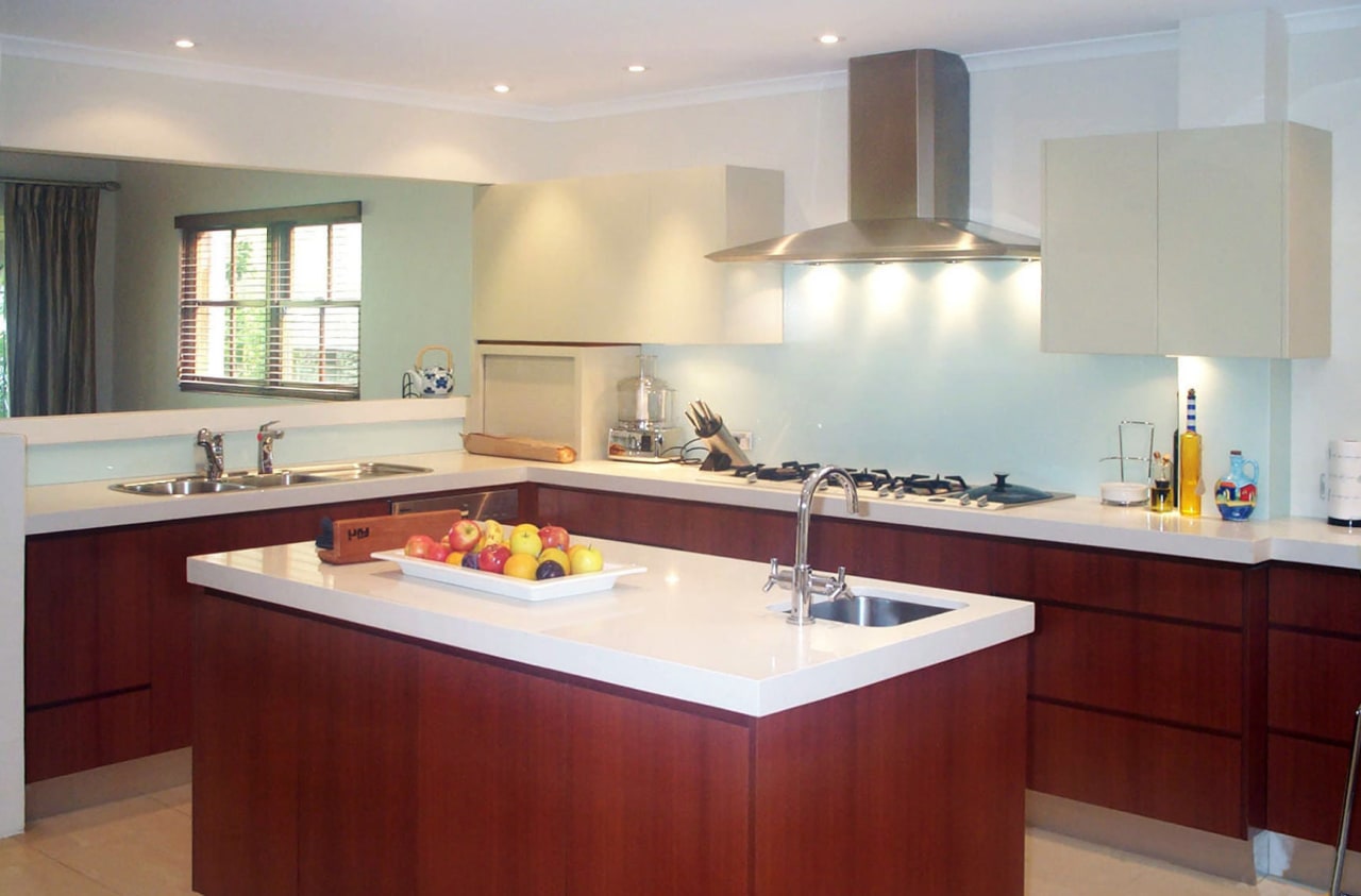 Everything is within reach in this design by cabinetry, countertop, cuisine classique, interior design, kitchen, property, real estate, room, gray, red