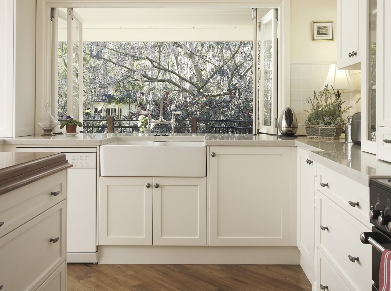 A view of a kitchen design by Nouvelle cabinetry, countertop, cuisine classique, floor, flooring, home, home appliance, interior design, kitchen, room, window, gray