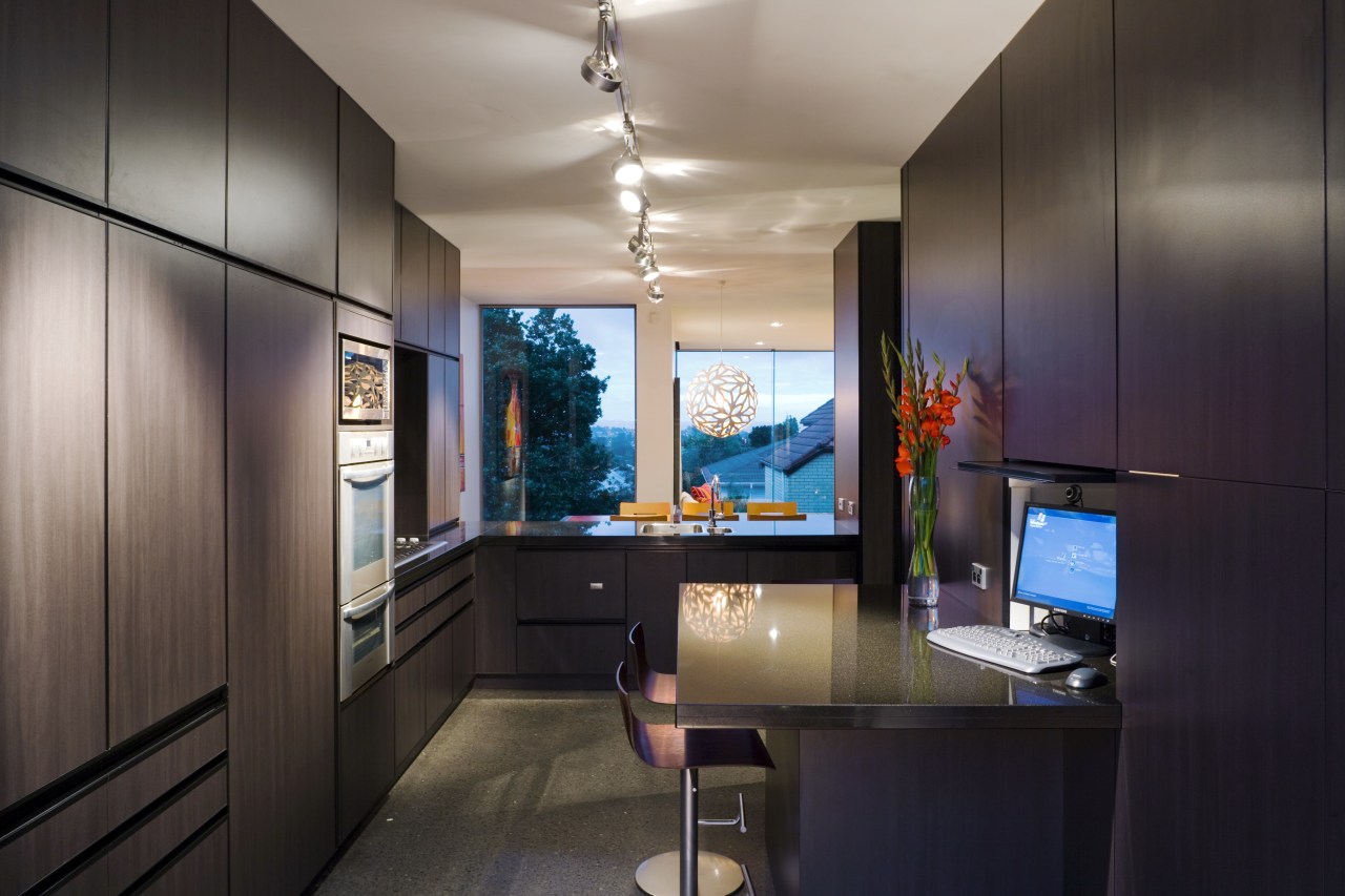 Kitchen inside contemporary home with black granite benchtops architecture, interior design, real estate, room, black, gray